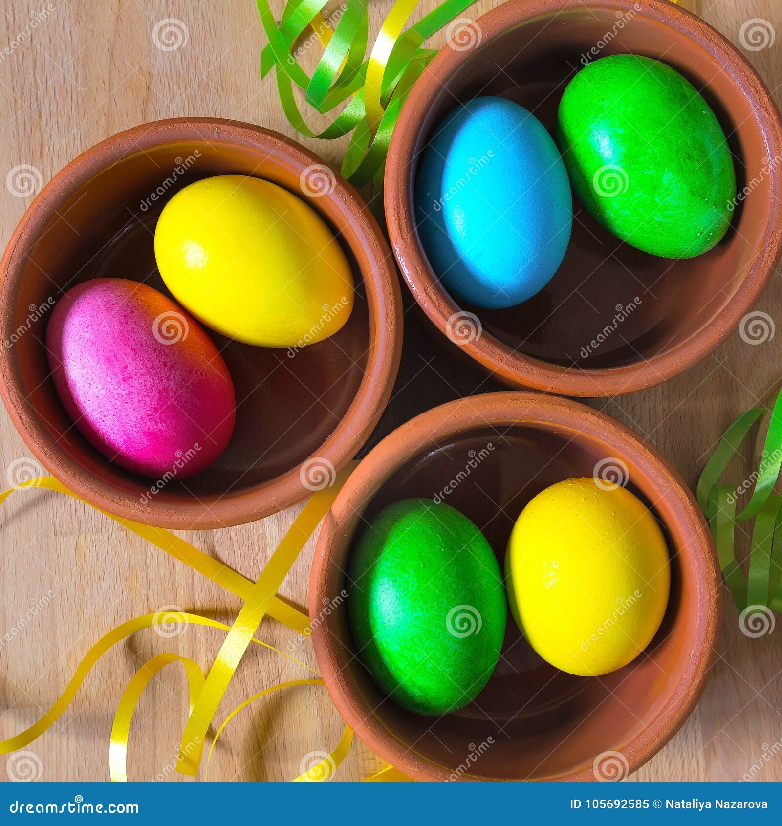 Colored Decorated Easter Eggs in Clay Bowls Stock Image - Image of ...