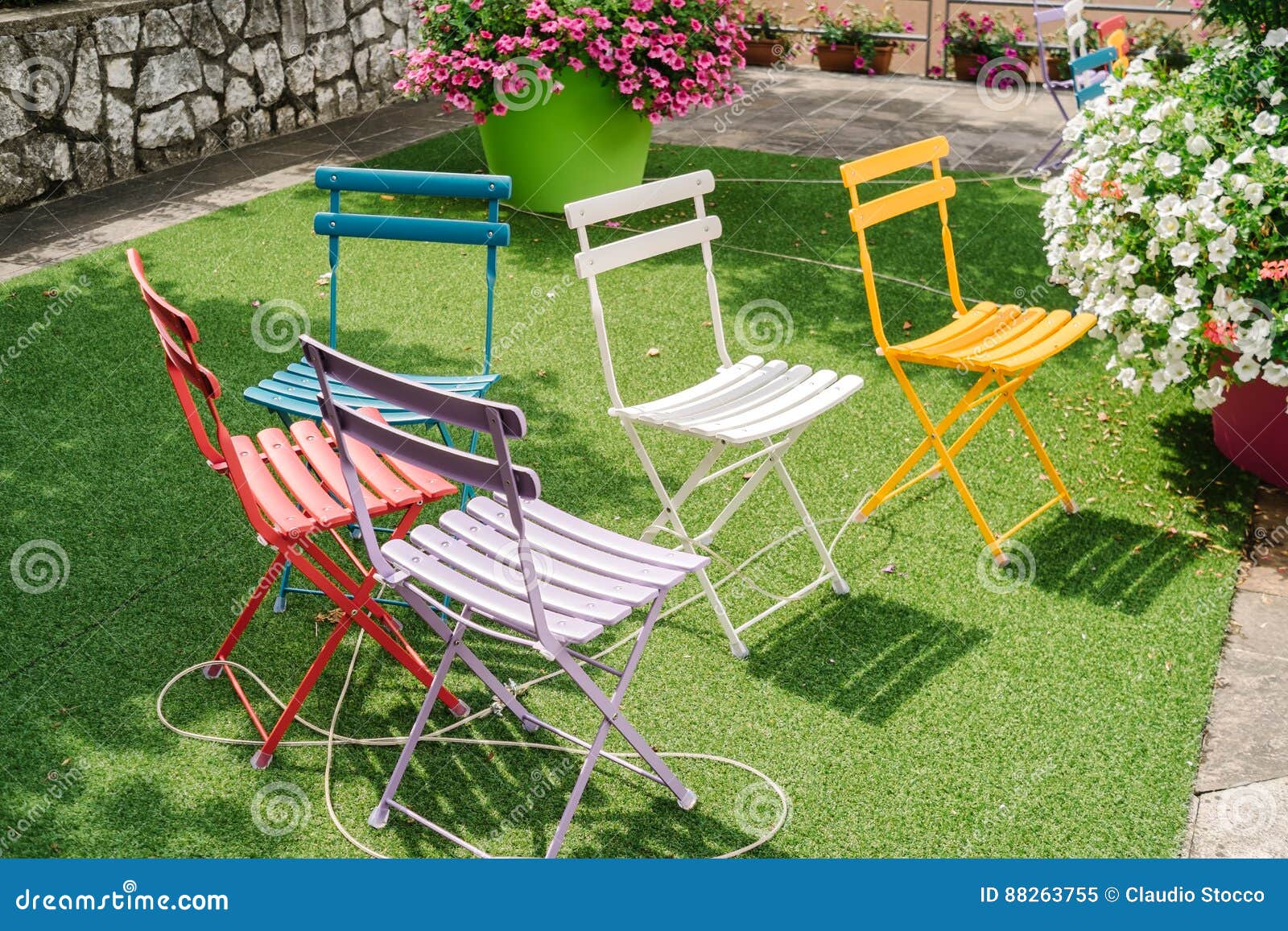 Colored garden chairs stock image. Image of outdoors 88263755