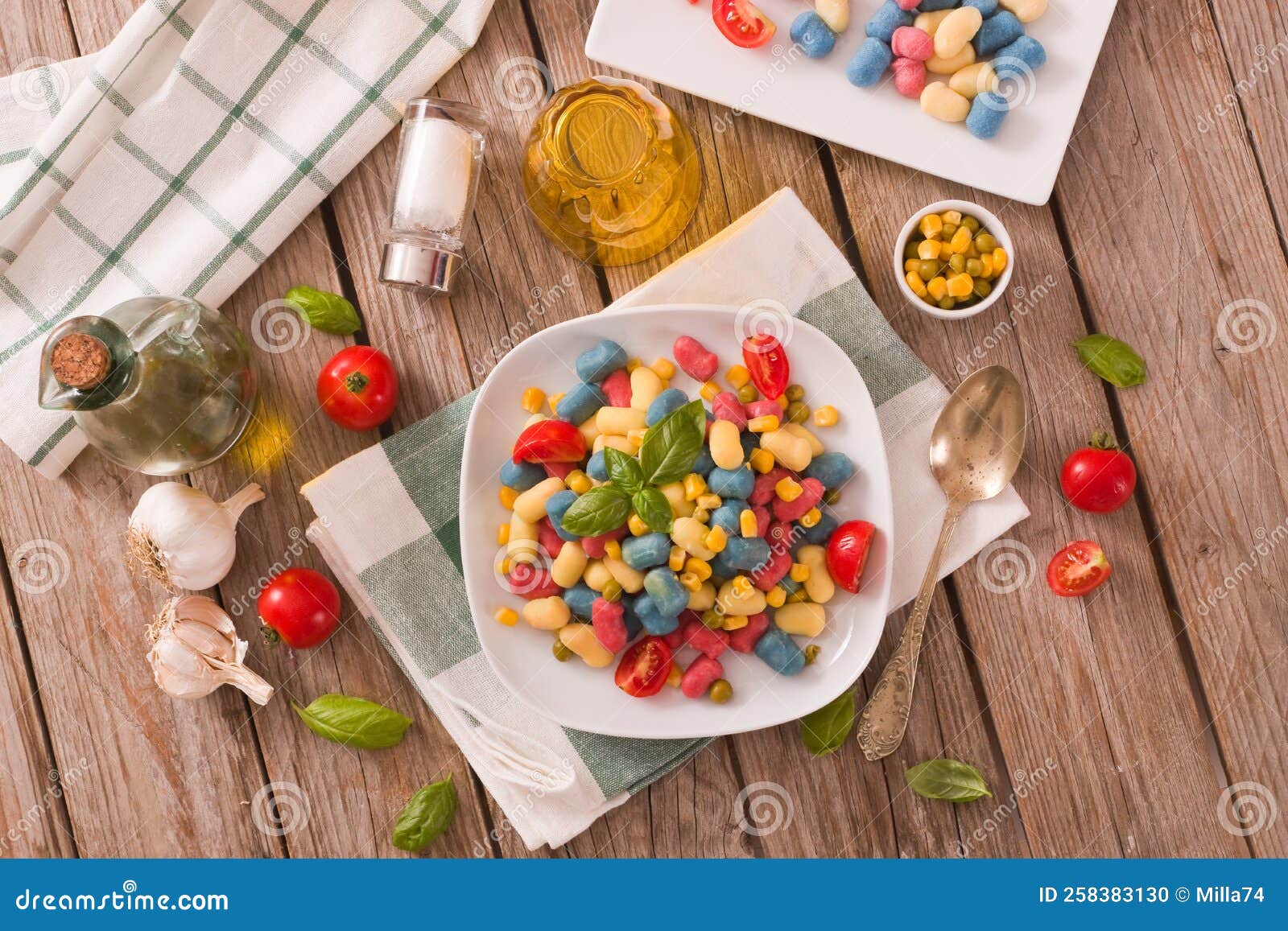 Colored Gnocchi with Vegetables and Sweet Corn. Stock Photo - Image of