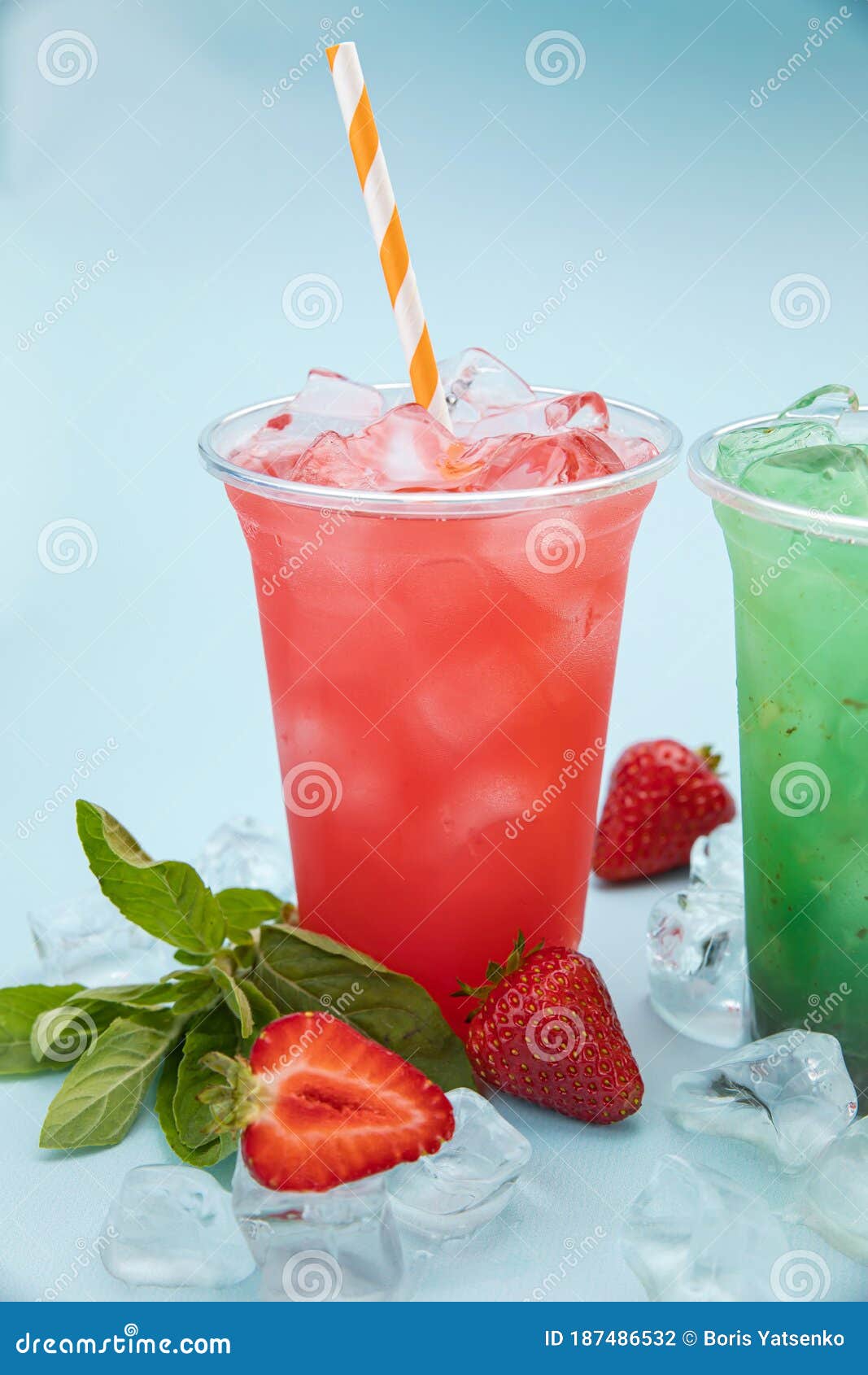 Colored Lemonades in Plastic Cups with Ice, Fruits and Berries Stock ...