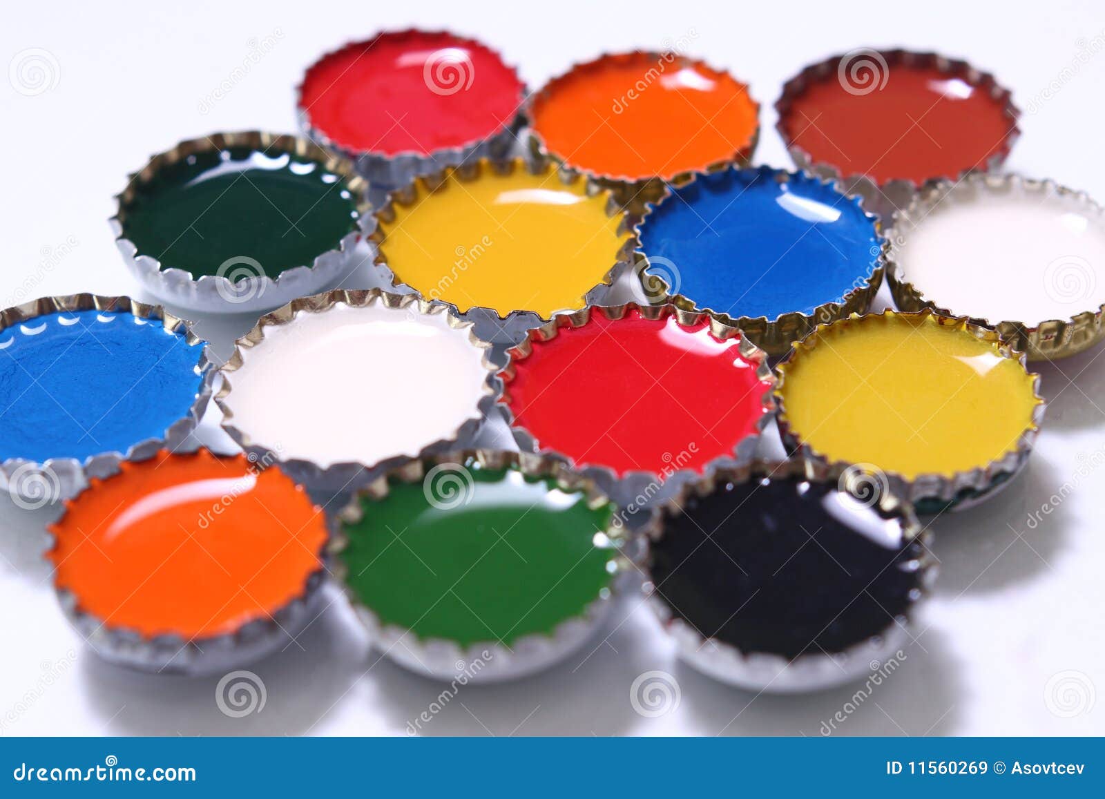 Colored PET Lids. Recycled Plastic Bottle Caps Isolated On White