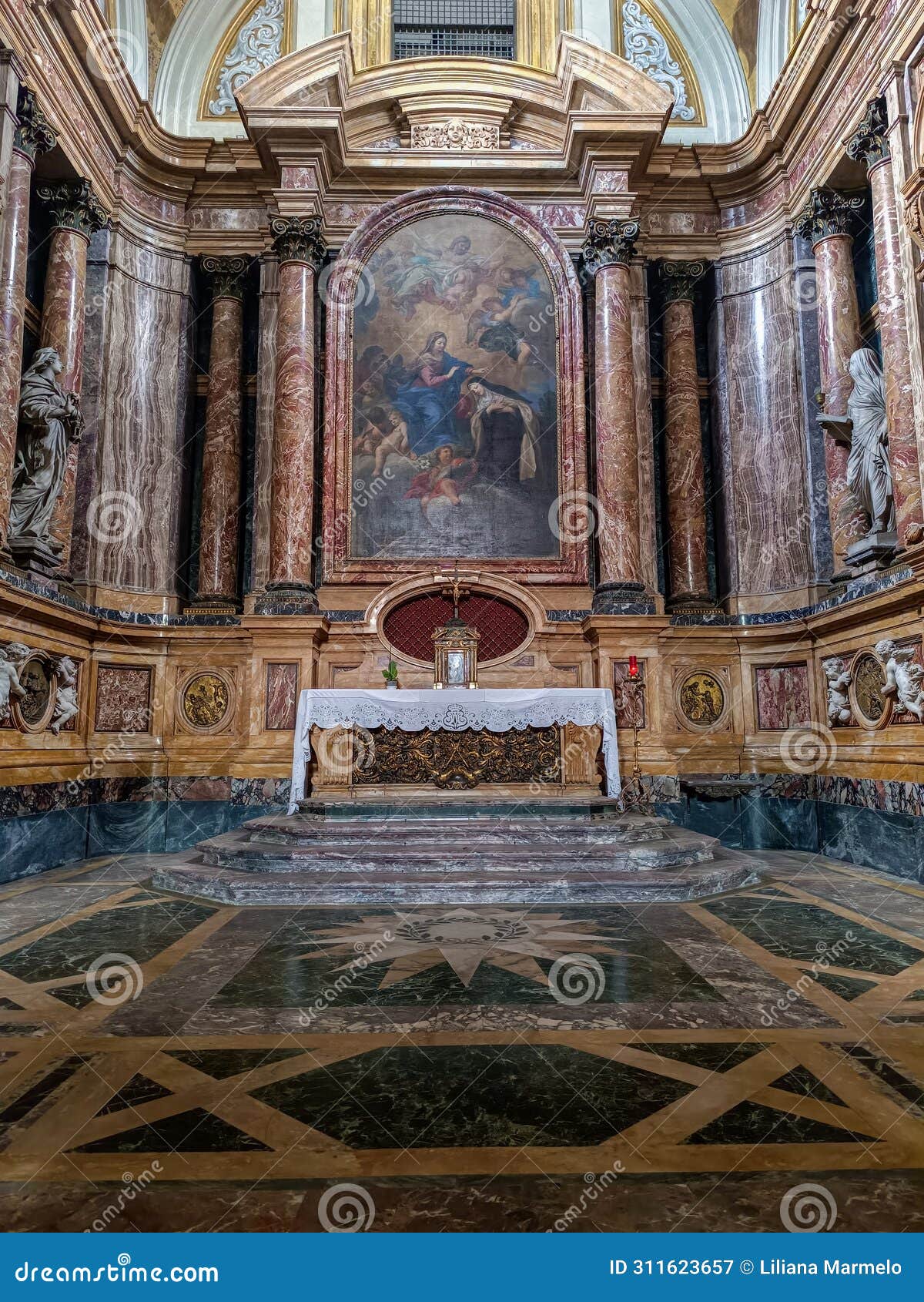 color marble altarpiece with columns and painting in the church santa maria maddalena dei pazzi, florence italy