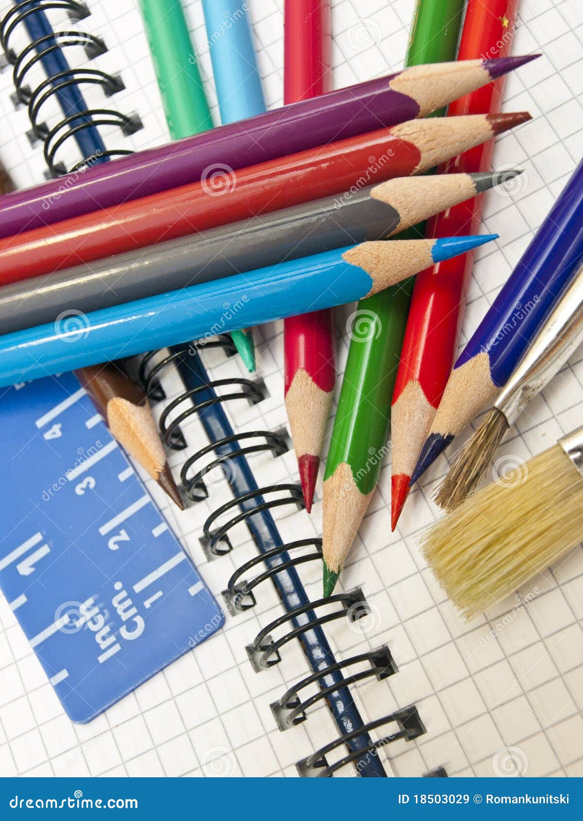 A set of markers and sketch pad Stock Photo by Nadianb