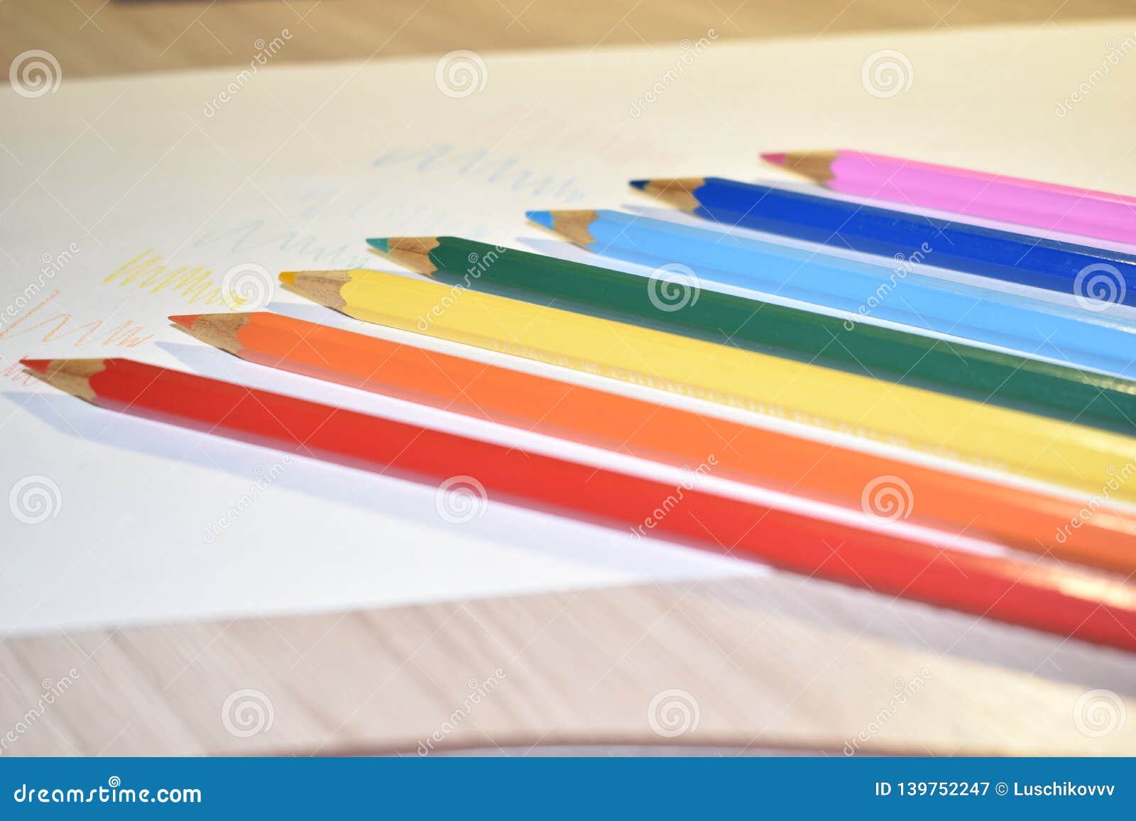 Colored Pencils On A Sheet Of White Paper Stock Image Image Of