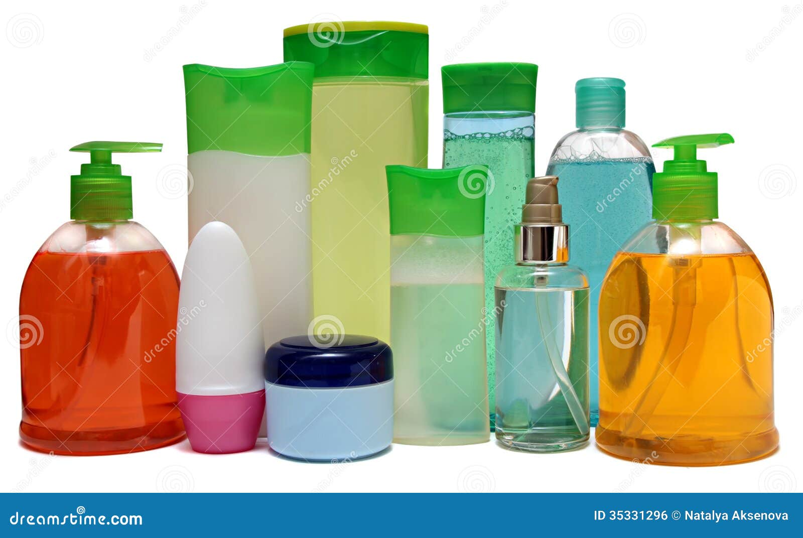 colored plastic bottles with liquid soap and