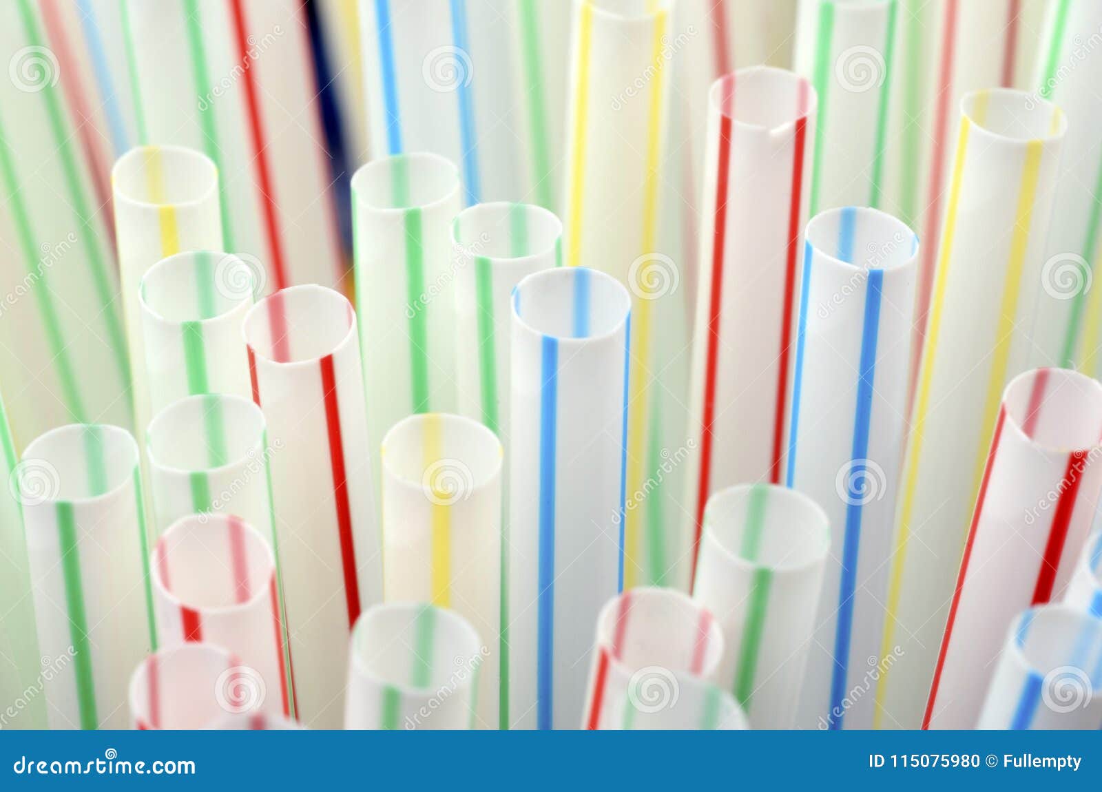 Colored plastic straws stock photo. Image of plastic 115075980