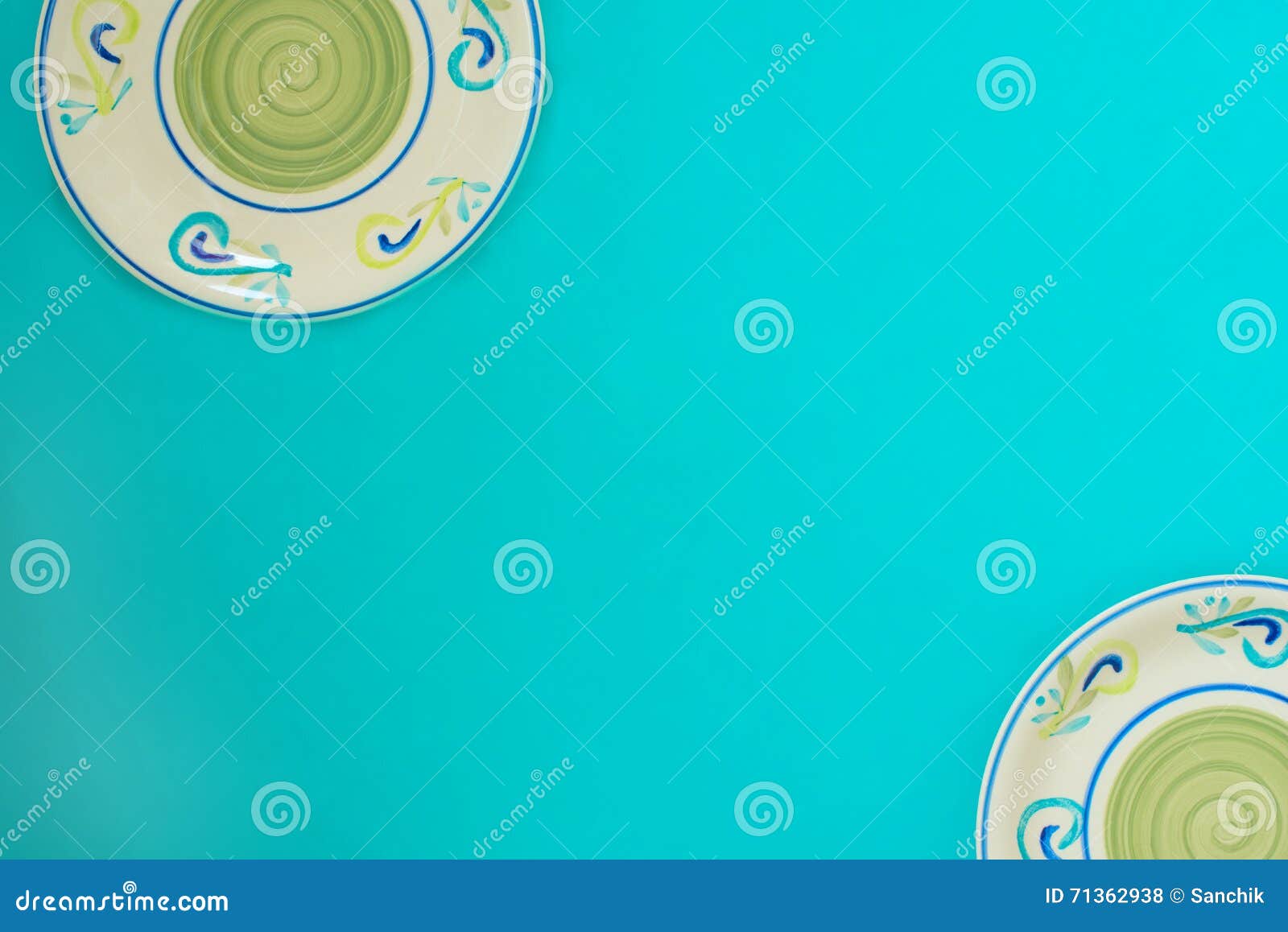 Colored Plates on a Green Background. Stock Photo Image of space