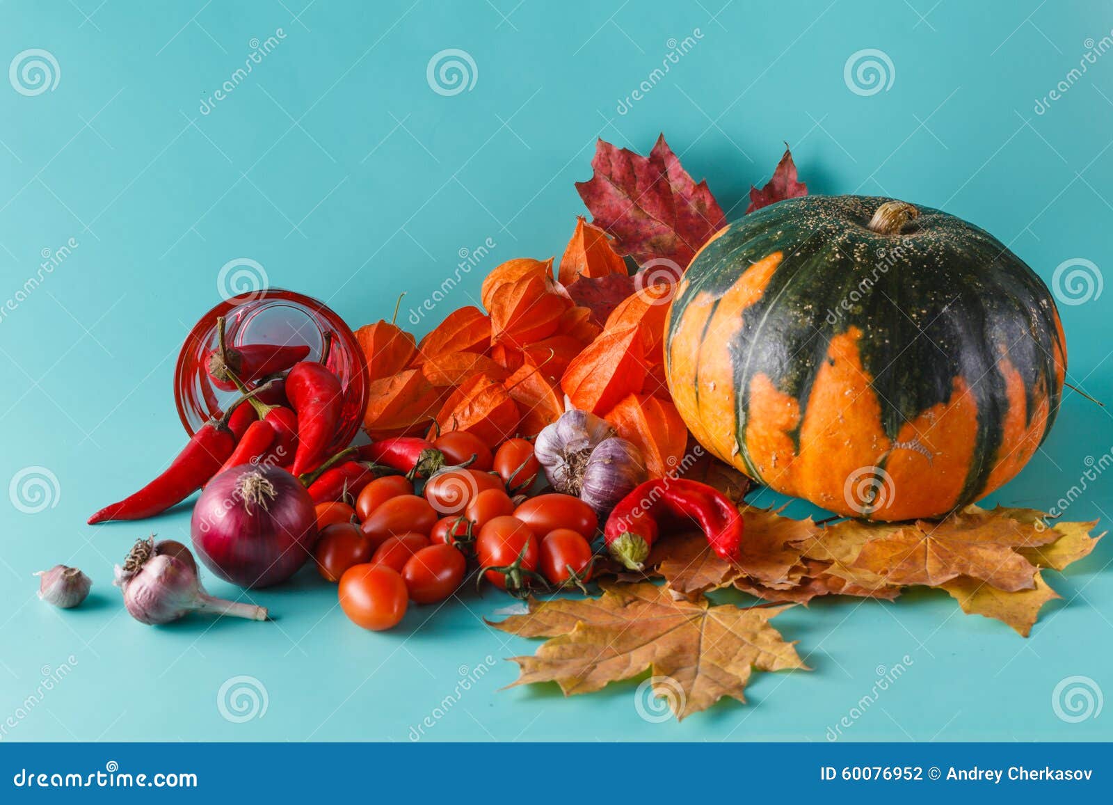 colored pumpkin and fchili on aquamarine shadowless background
