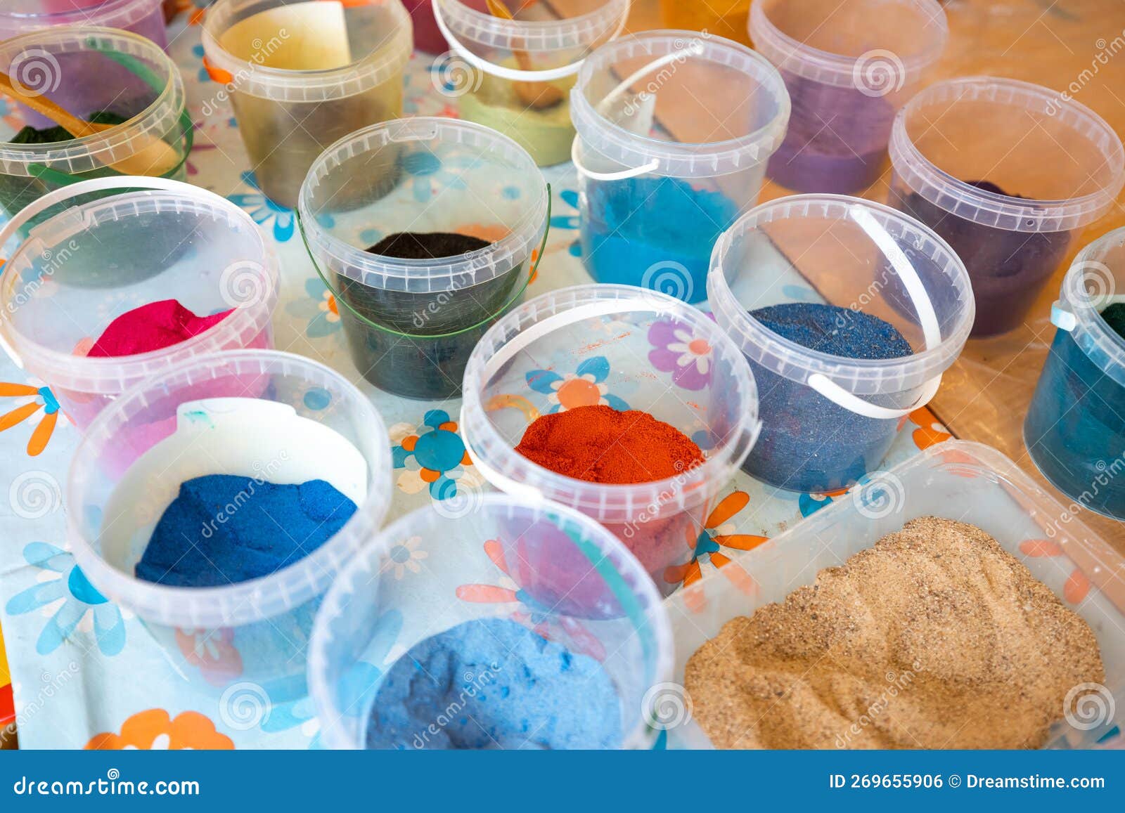 Colored Sand in Plastic Containers, Perfect for Art and Crafts Stock
