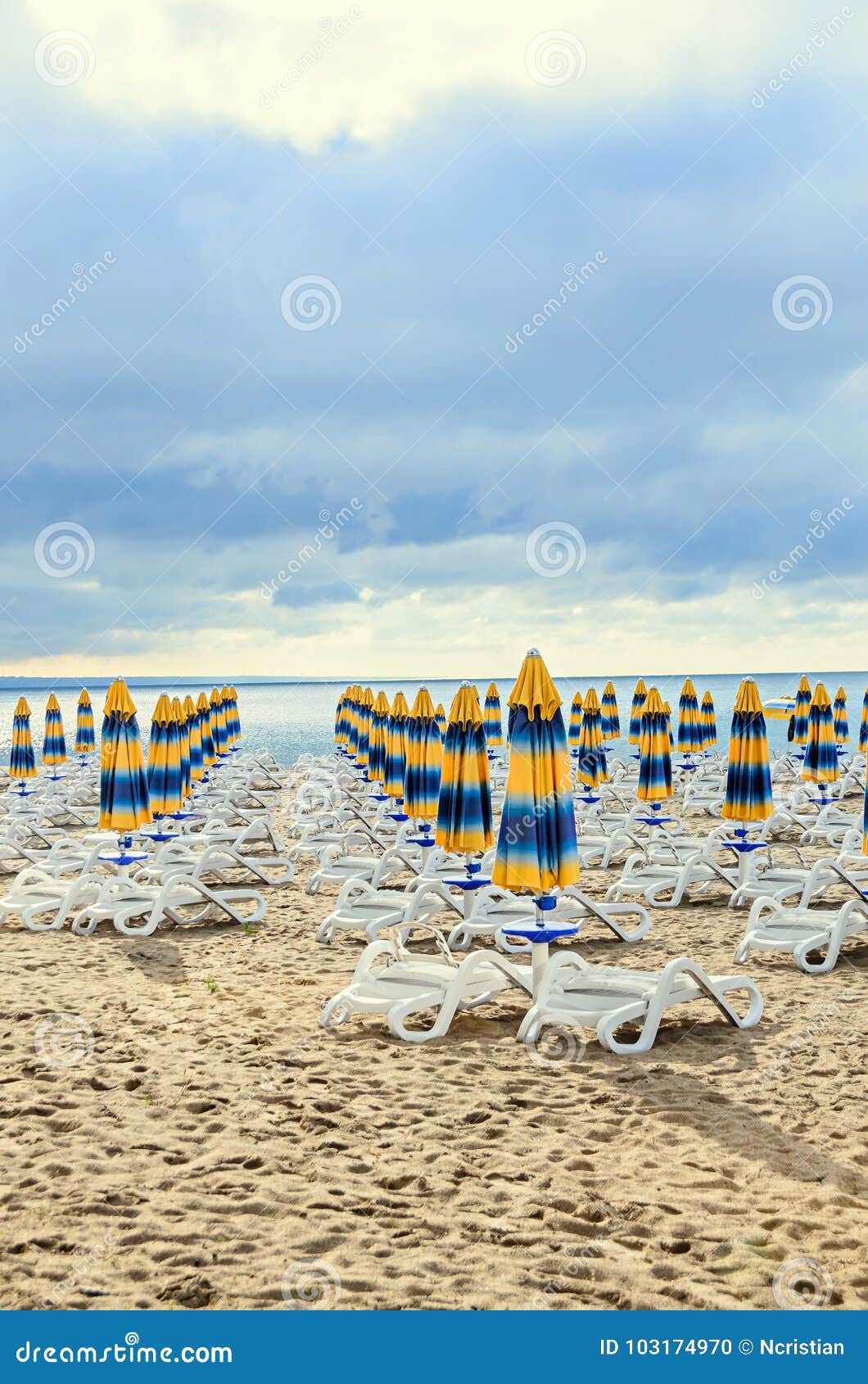 Colored Stripped Sun Umbrellas, Golden Beach Sand and Sunbeds, S Stock ...