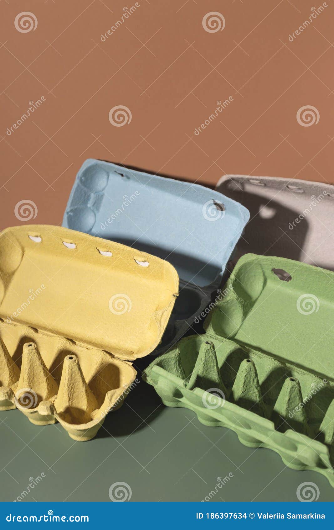 Colored Trays from Eggs. Garbage Collection for Recycling Concept