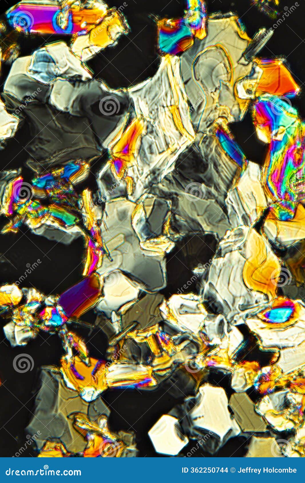 colorful abstract micrograph of histidine crystals, with polarization