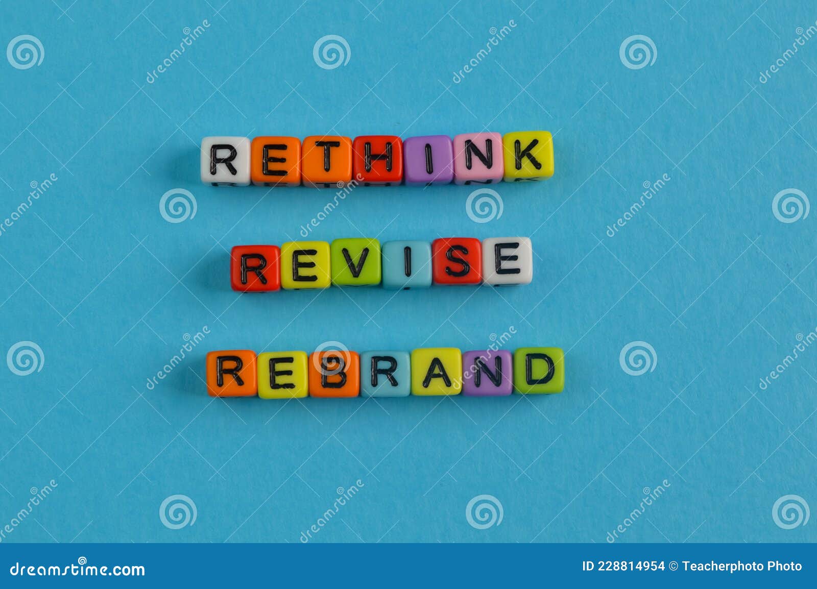 colorful alphabet beads with text rethink, revise and rebrand
