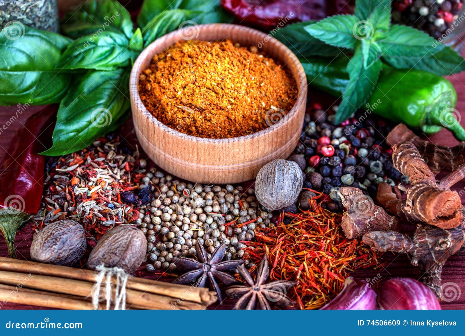 Colorful Aromatic Spices and Herbs on a Wooden Brown Backgrownd Stock