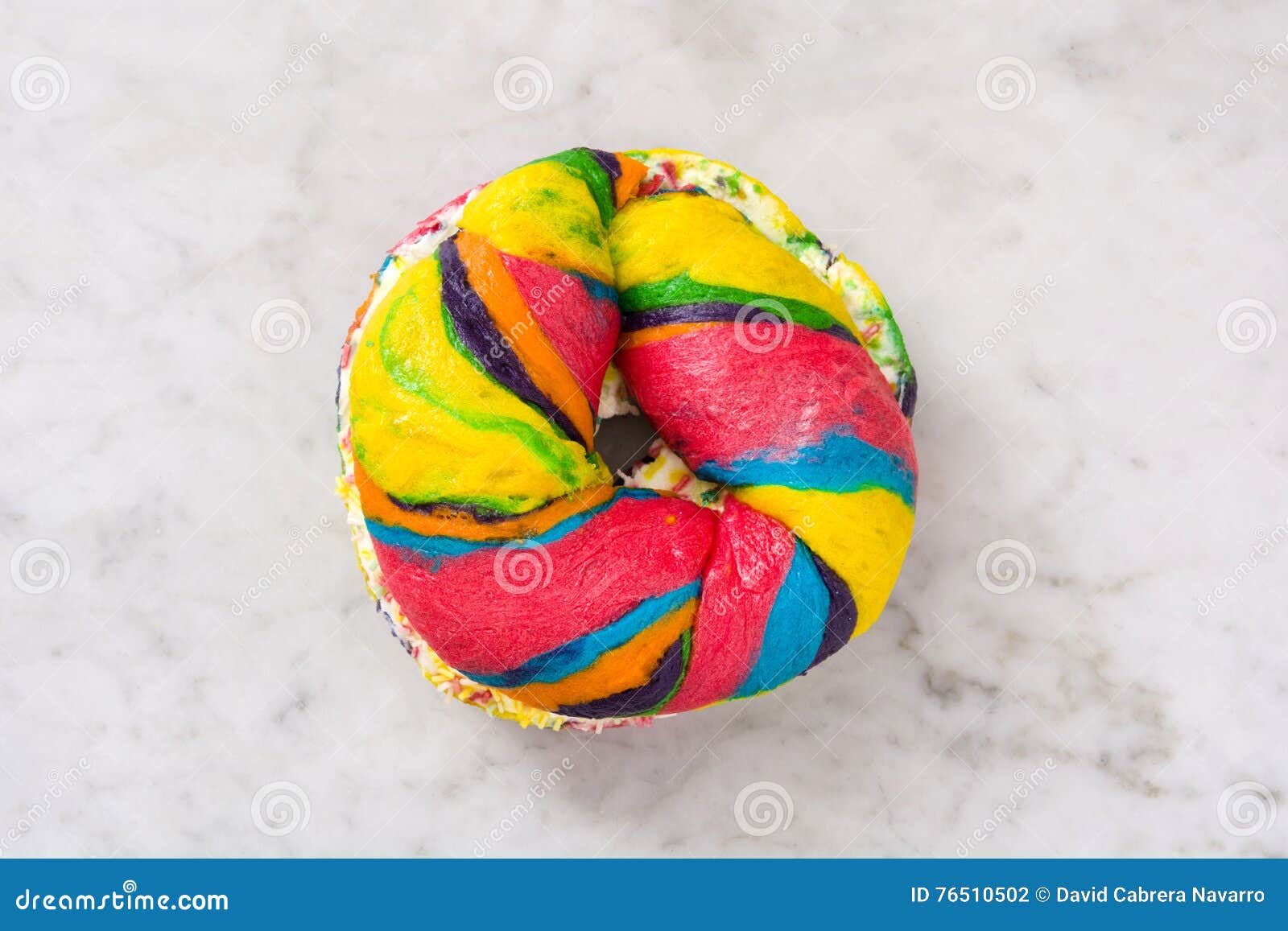Colorful Bagel with Cheese and Sprinkles on Marble Stock Photo Image