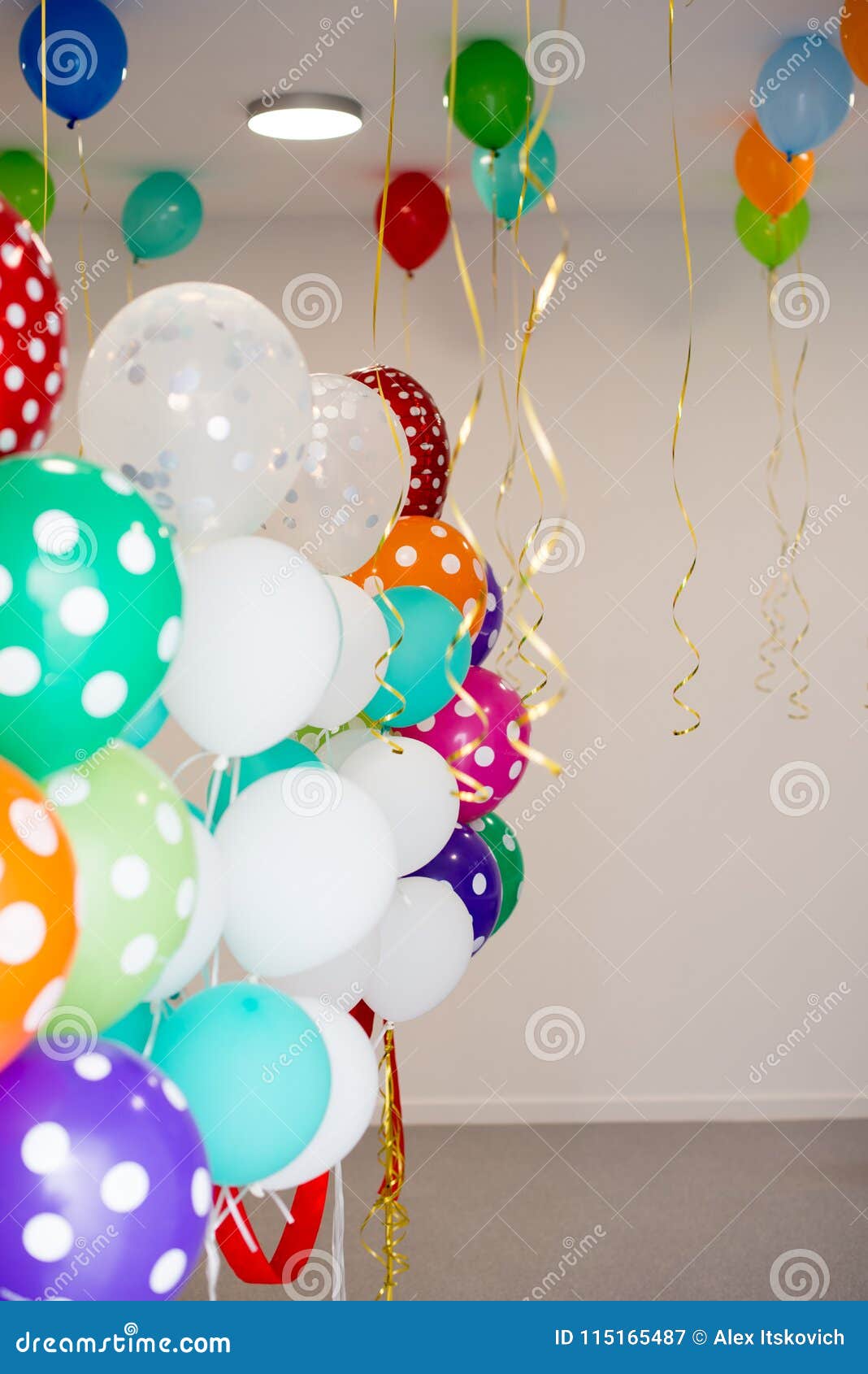 Colorful Balloons Hang Under The White Ceiling Stock Image