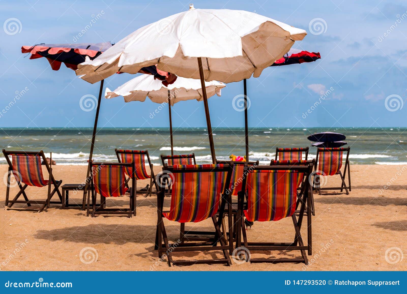 Colorful Beds and Umbrella on a Tropical Beach Stock Photo - Image of ...