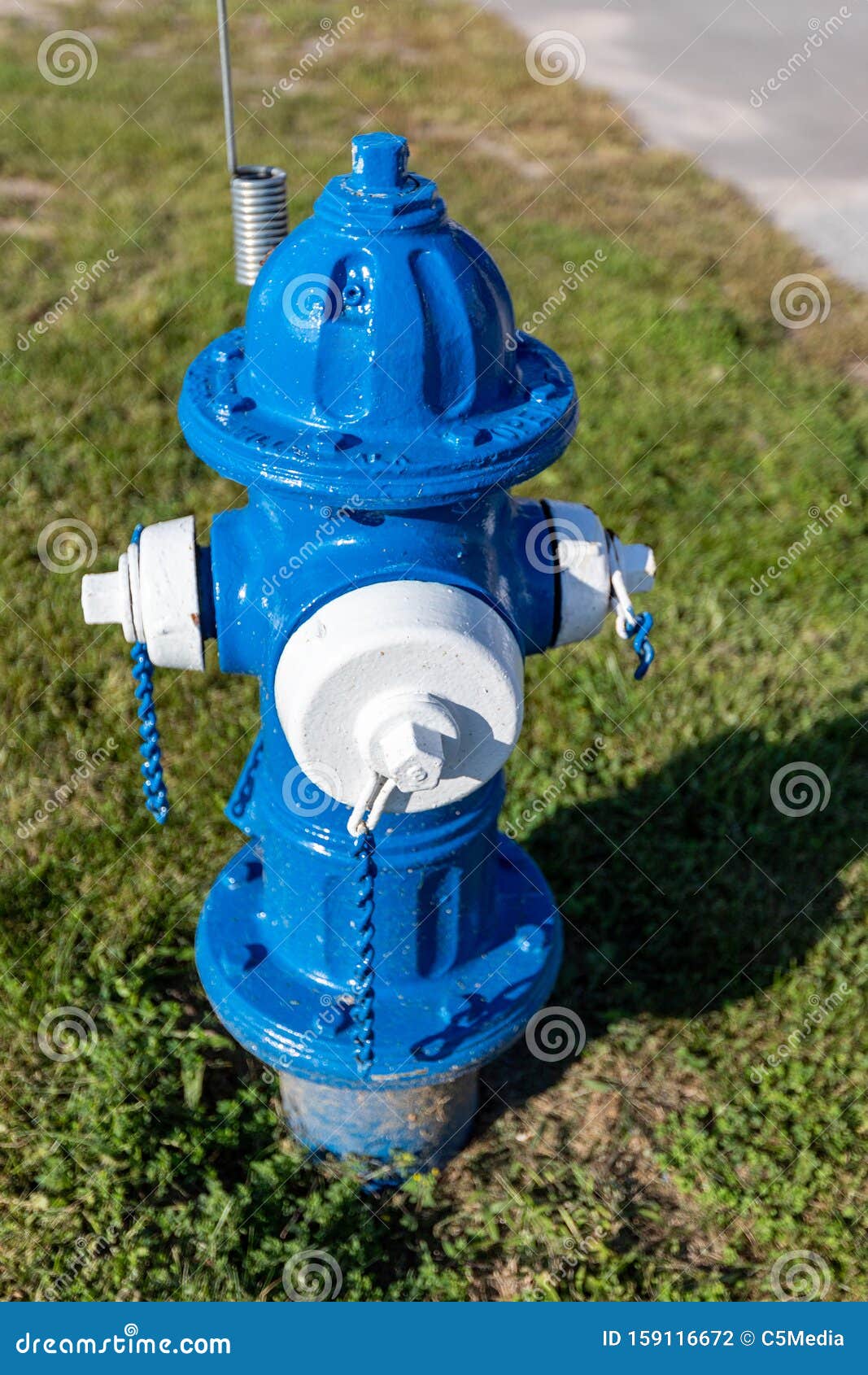 Colorful Blue And White Fire Hydrant Used For Supplying Water