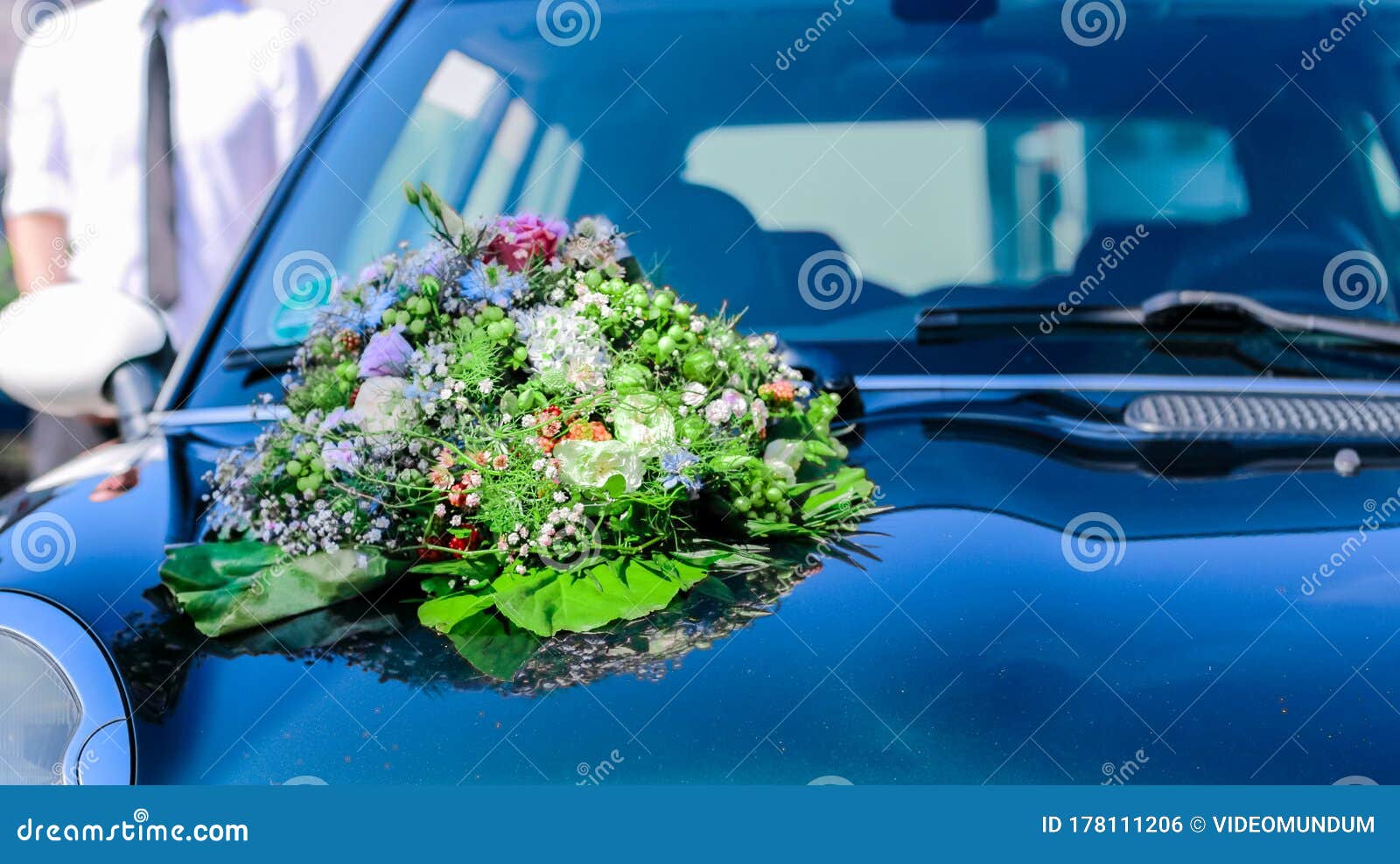 Colorful Bouquet of Flowers on a Car`s Hood Wedding Decoration