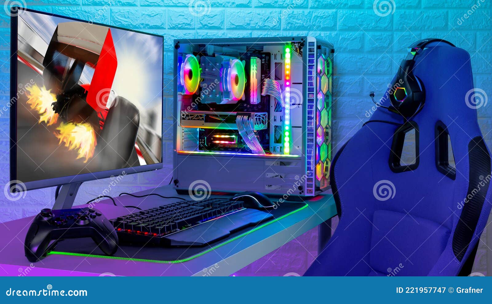 colorful bright illuminated rgb gaming pc with keyboard mouse monitor and chair with racing  screen in front of led light brick