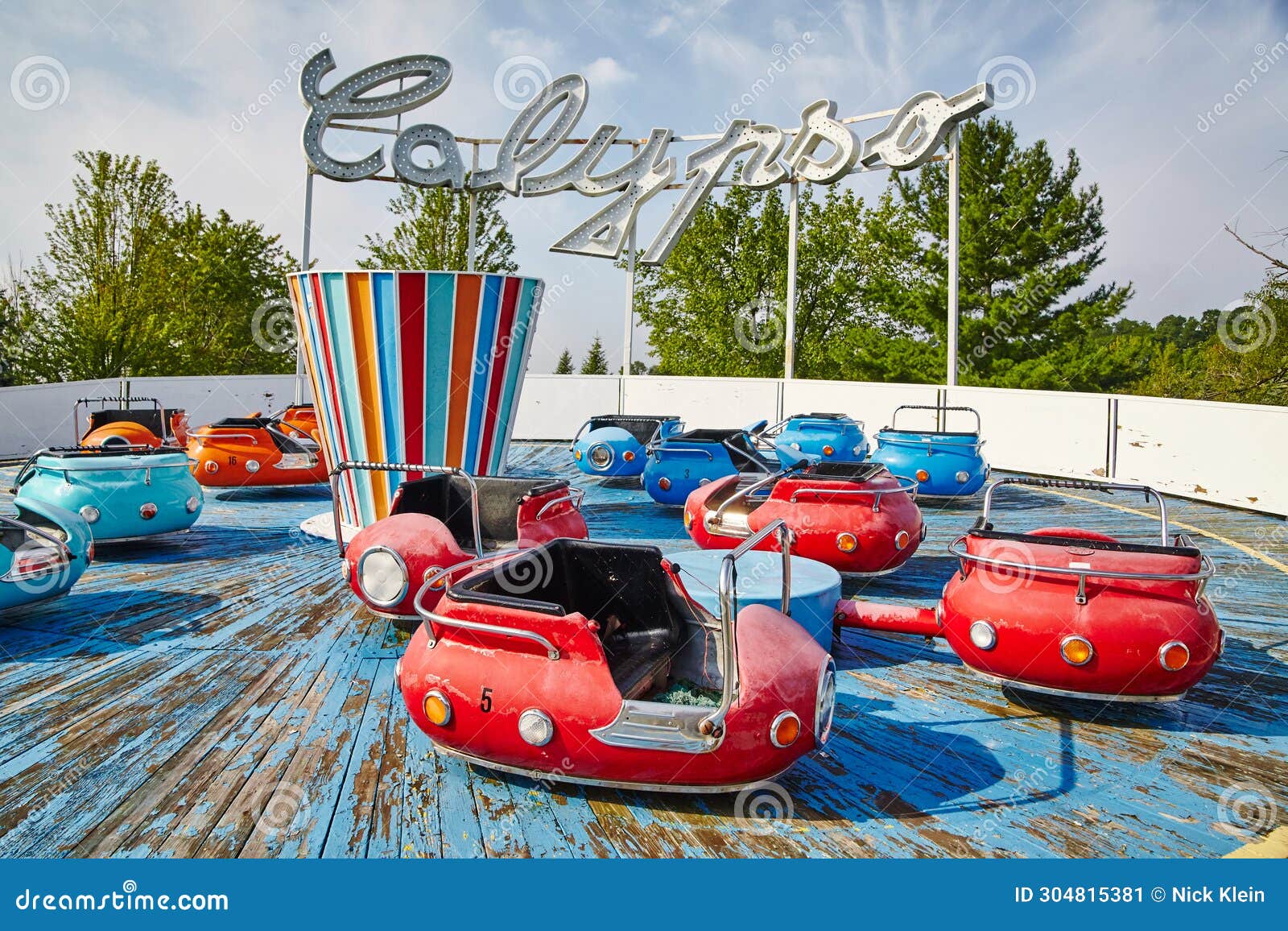 Colorful Bumper Cars at Abandoned Fun Spot Amusement Park Stock Image