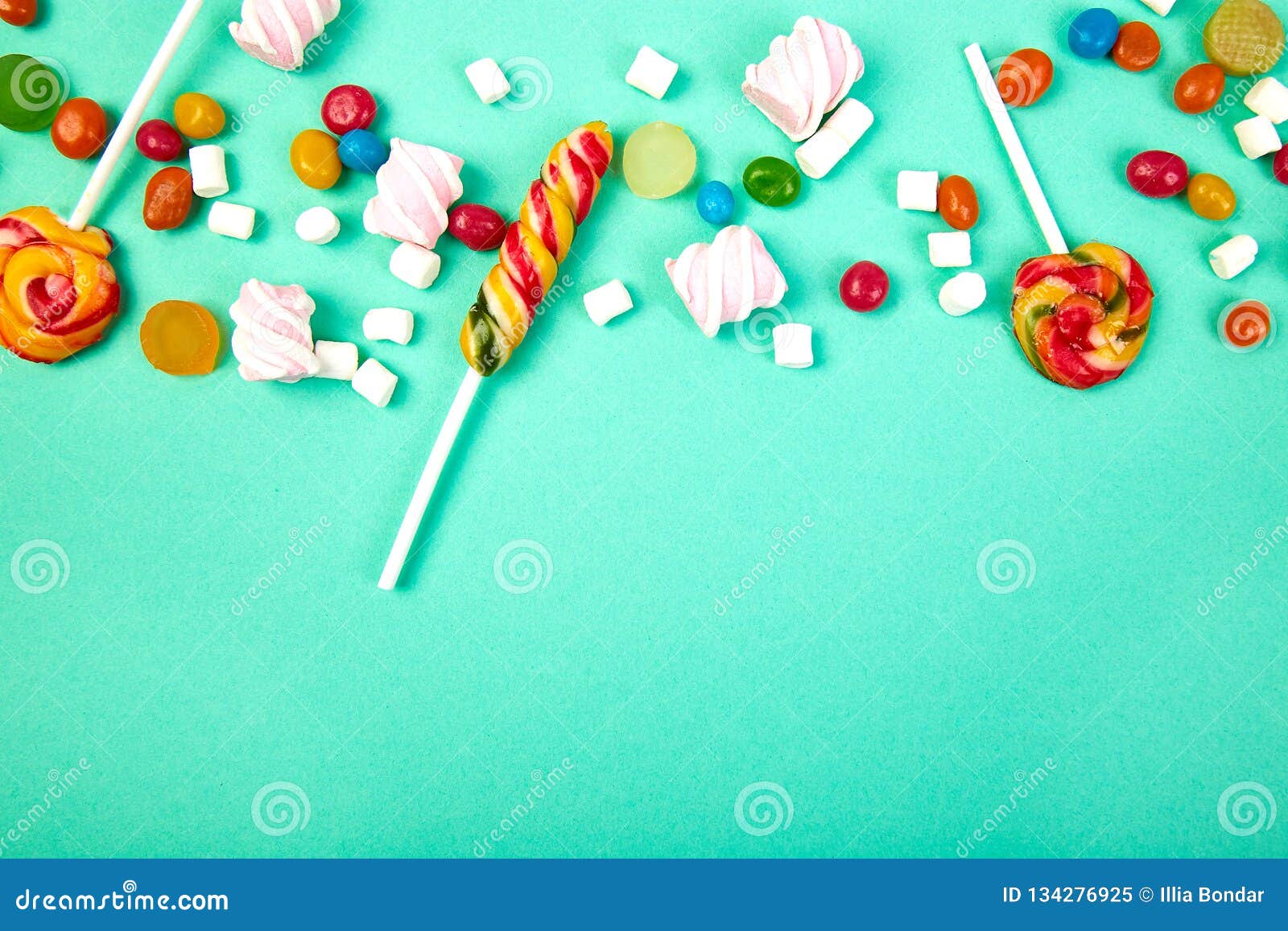 Colorful Candies on Pastel Turquoise Background. Flat Lay Stock Image ...