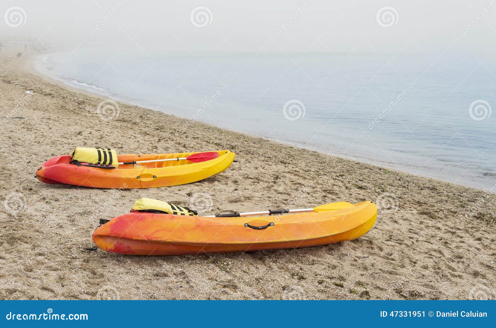 Colorful Canoe Boats on Sea Shore in Thick Fog Stock Image - Image of ...