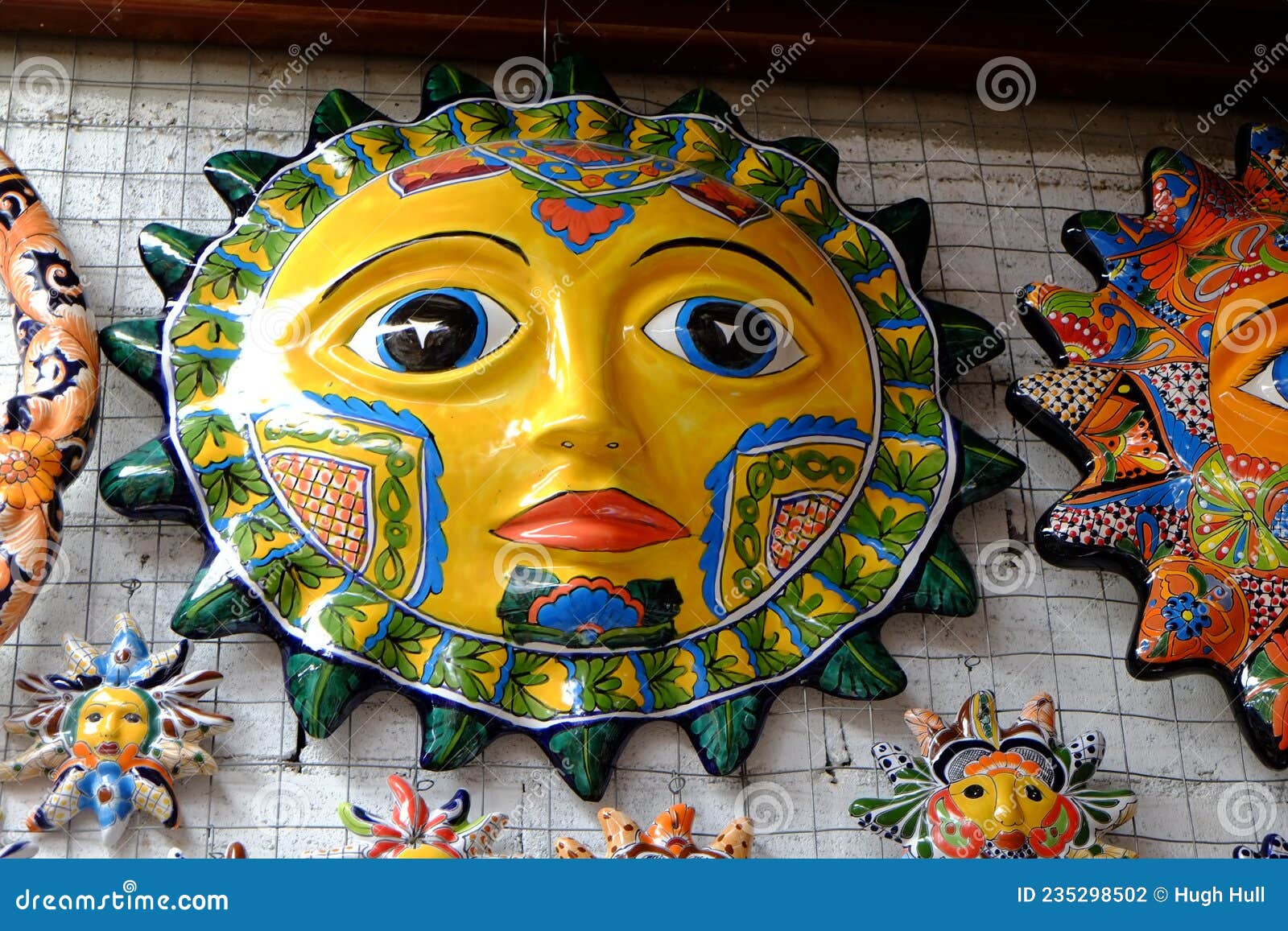 ceramic sun faces on display in la tienda at puerto penasco mexico