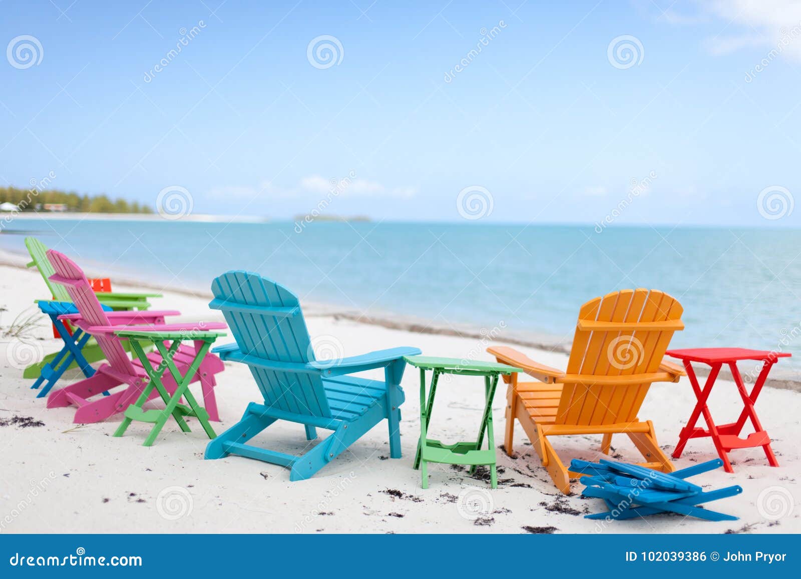Colorful Chairs on a Beach. Stock Photo - Image of sand, beach: 102039386