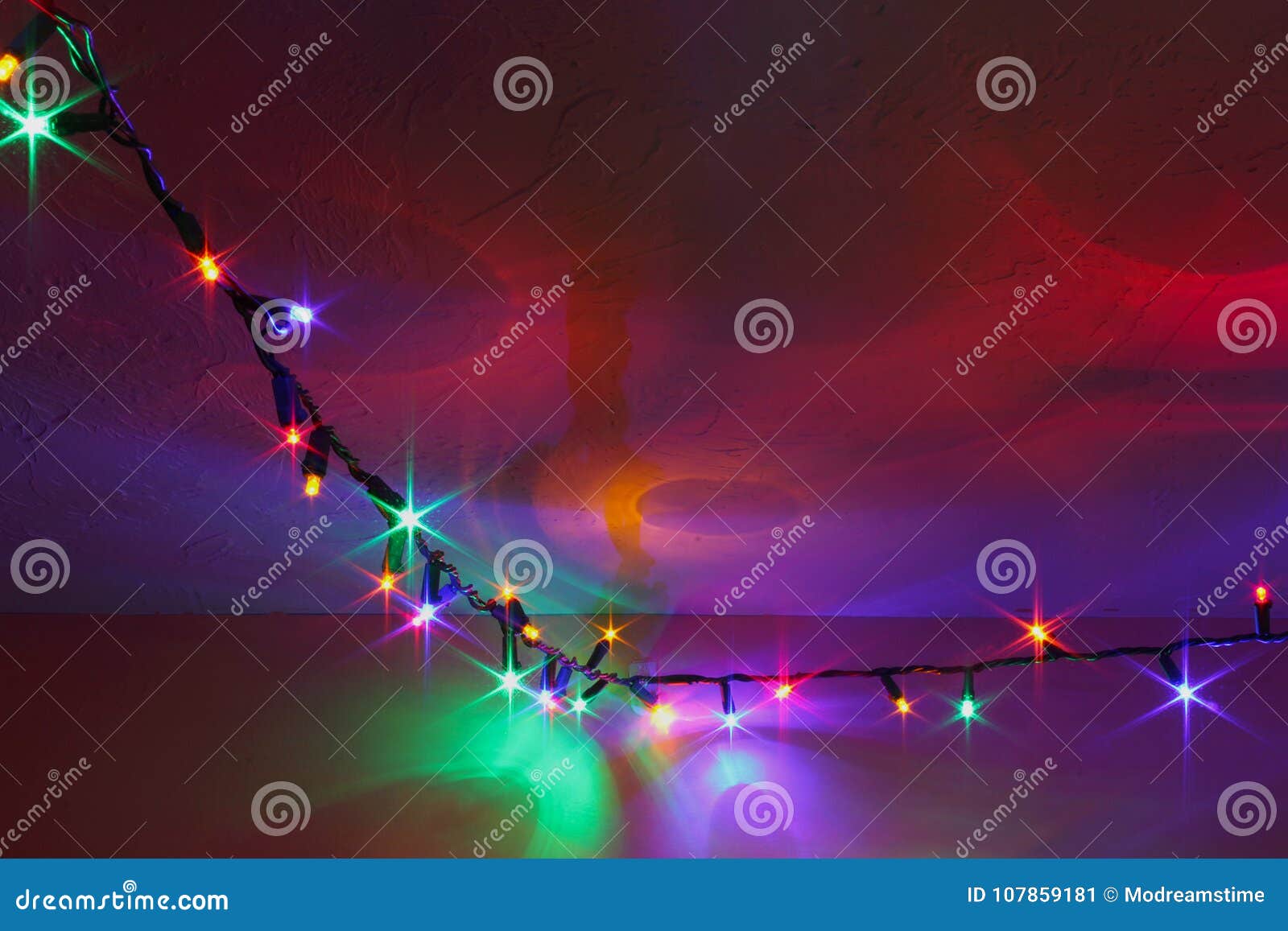 Colorful Christmas Lights Reflecting On Wall Ceiling Stock