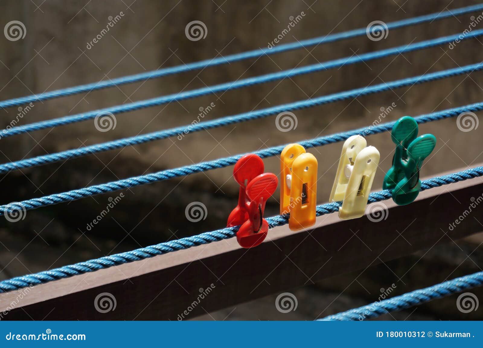Colorful Clothespin Clothespins on the Hangers. Stock Photo - Image of ...