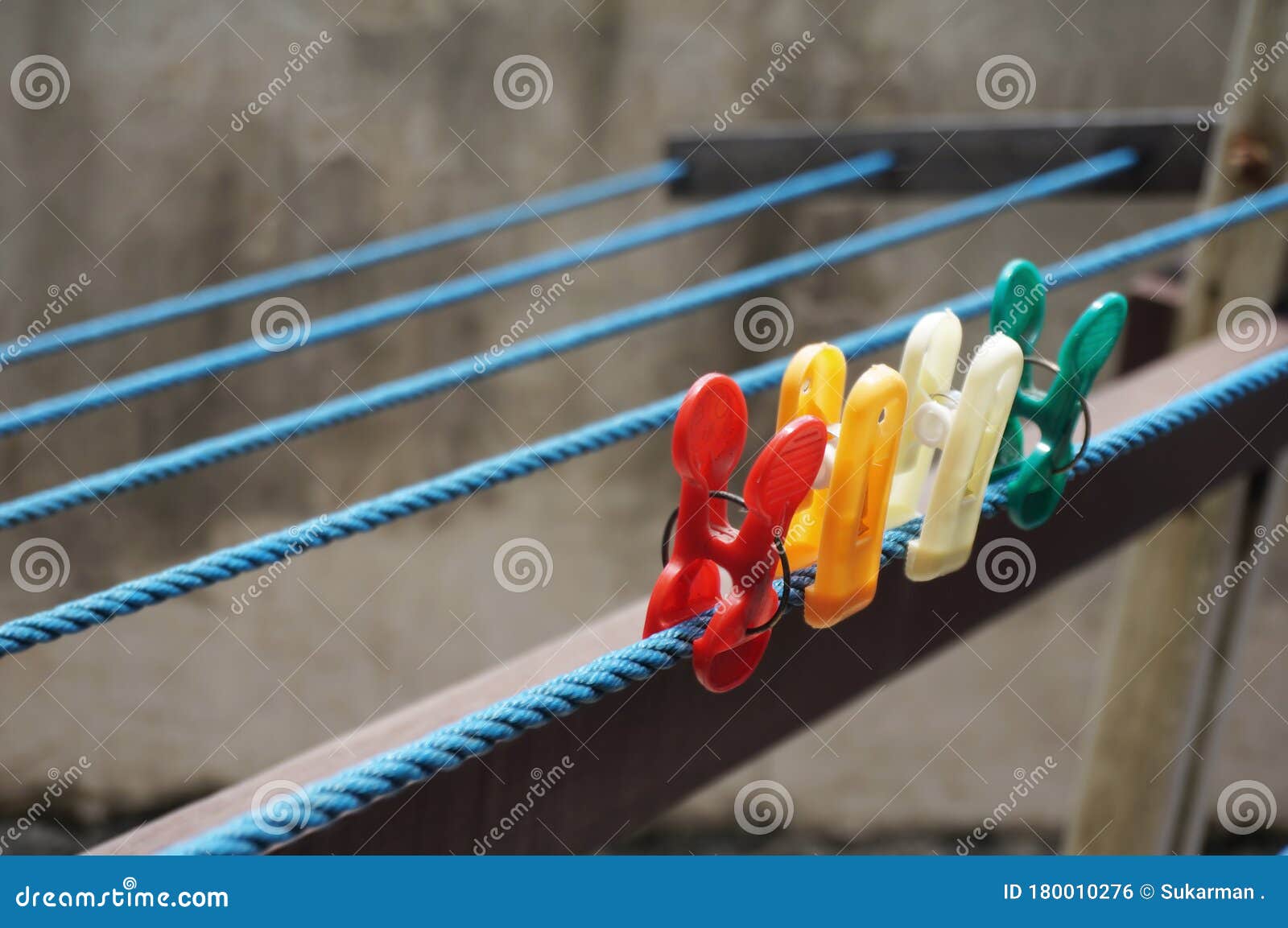 Colorful Clothespin Clothespins on the Hangers. Stock Photo Image of