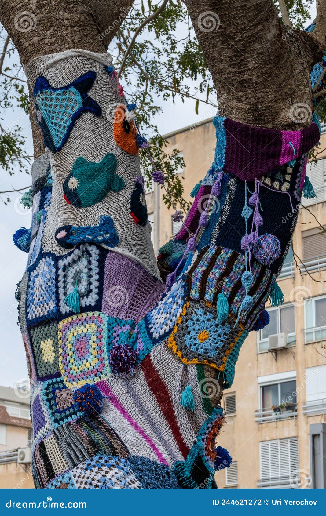 Colorful Crochet Knit on a Tree Trunk Yarn Bombing. Patchwork Knitted  Crochet Covered Tree for Warmth, Protection and Editorial Photography -  Image of anonymous, creativity: 244621272