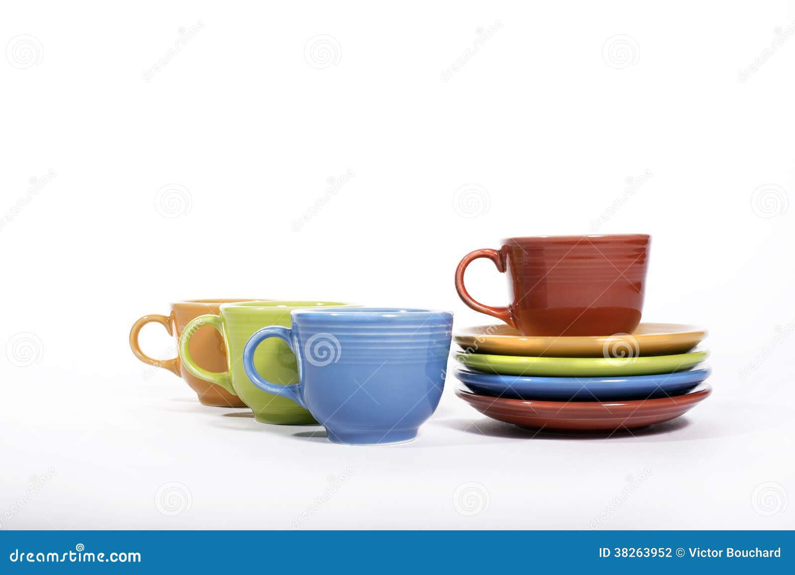 Colorful Cups and saucers stock photo. Image of multi 38263952