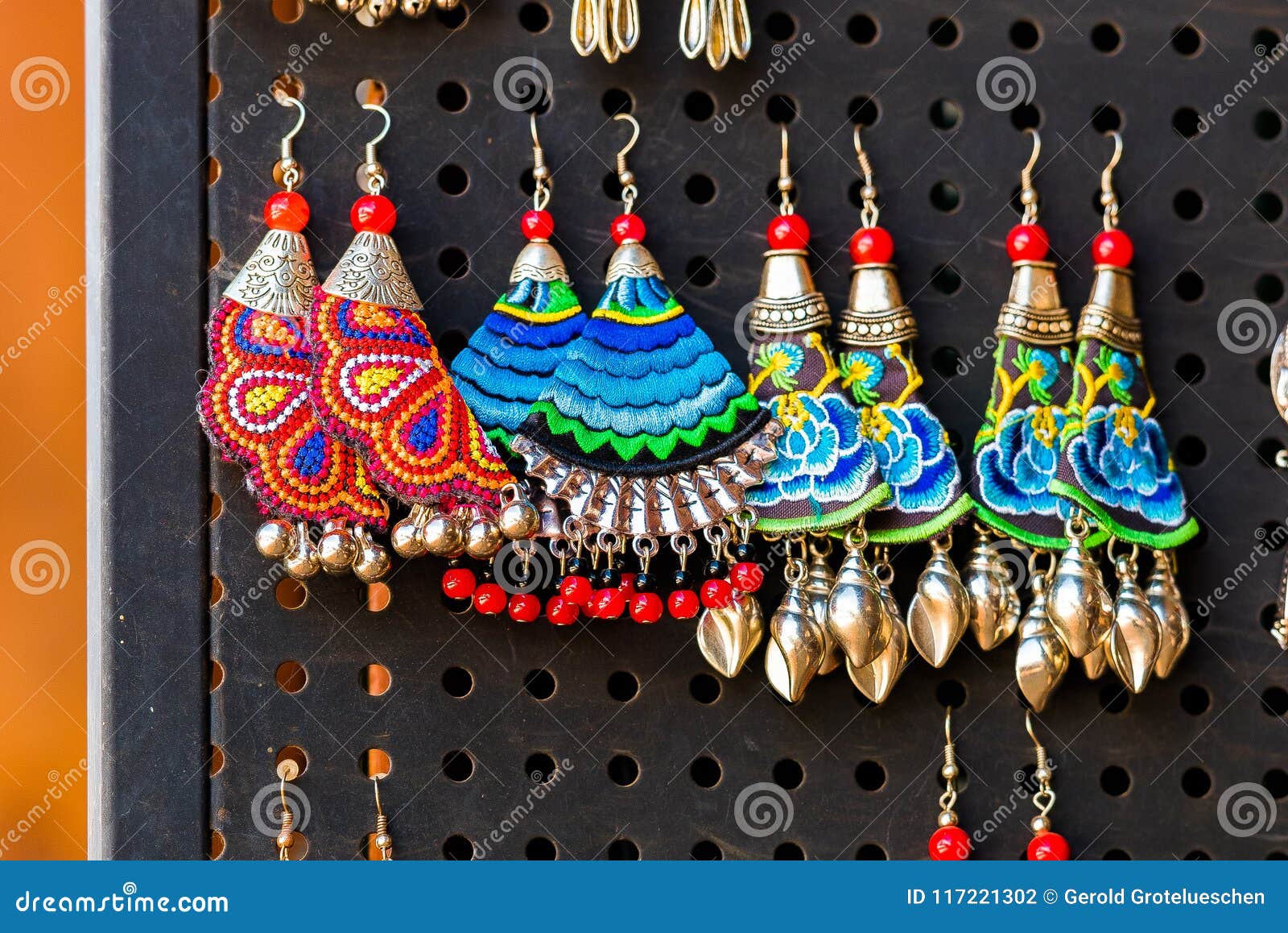 handmade colorful of various form decorative earrings jewelry sale in  outdoor fair market Stock Photo - Alamy