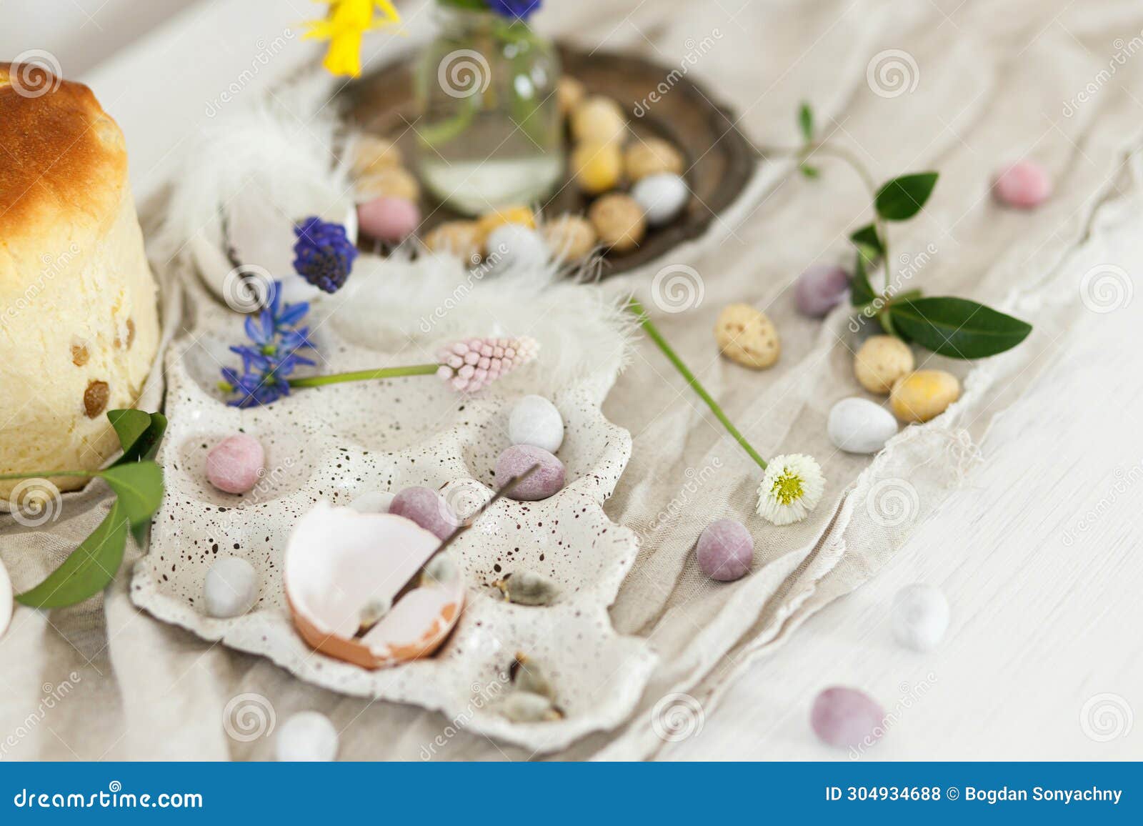 Colorful Easter Chocolate Eggs, Easter Bread, Spring Flowers and Linen ...