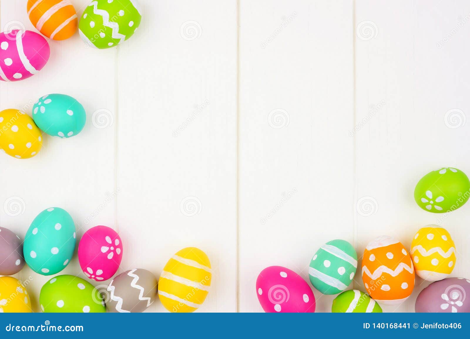 colorful easter egg frame or corner border over a white wood background