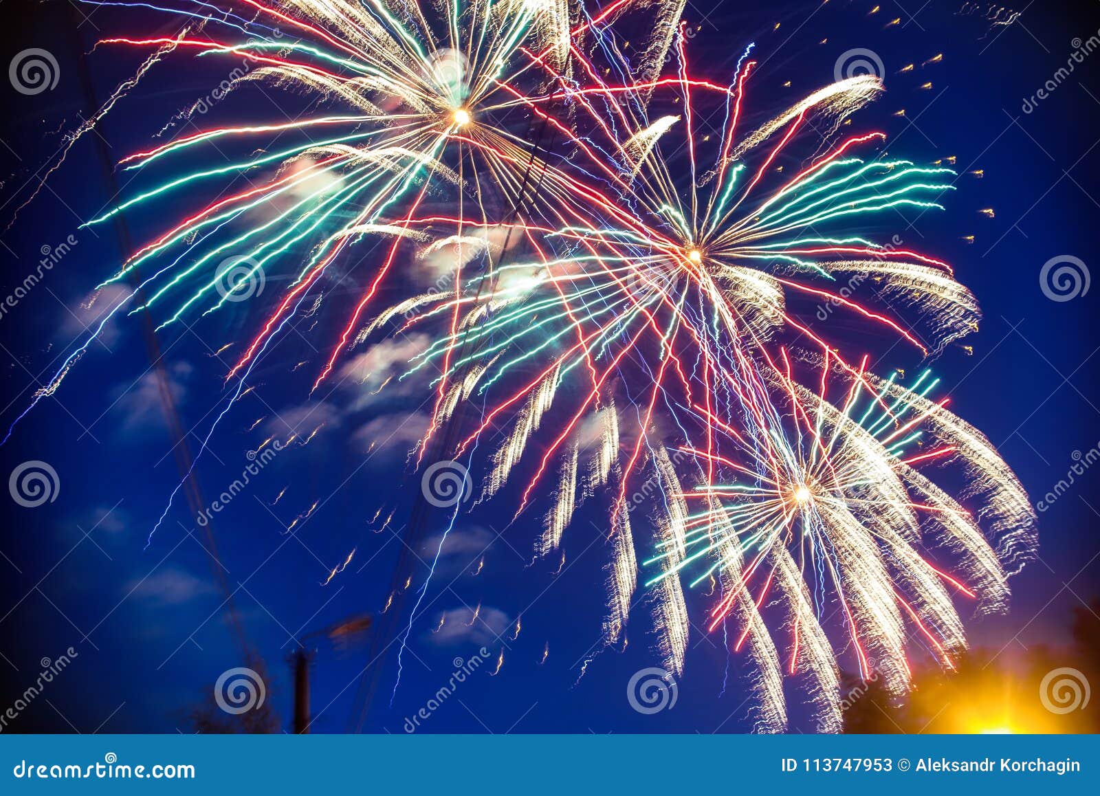 Colorful fireworks on background night sky. The explosions of the salute from the pyrotechnics. Colorful fireworks on the background night sky. The explosions of the salute from the pyrotechnics at the festival