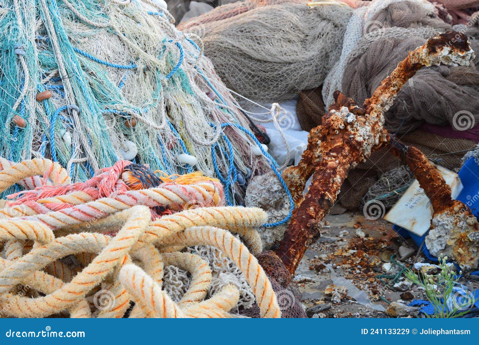 Colorful Fishing Nets of Different Types, Ropes and Oxidated Anchor Stock  Image - Image of nylon, little: 241133229