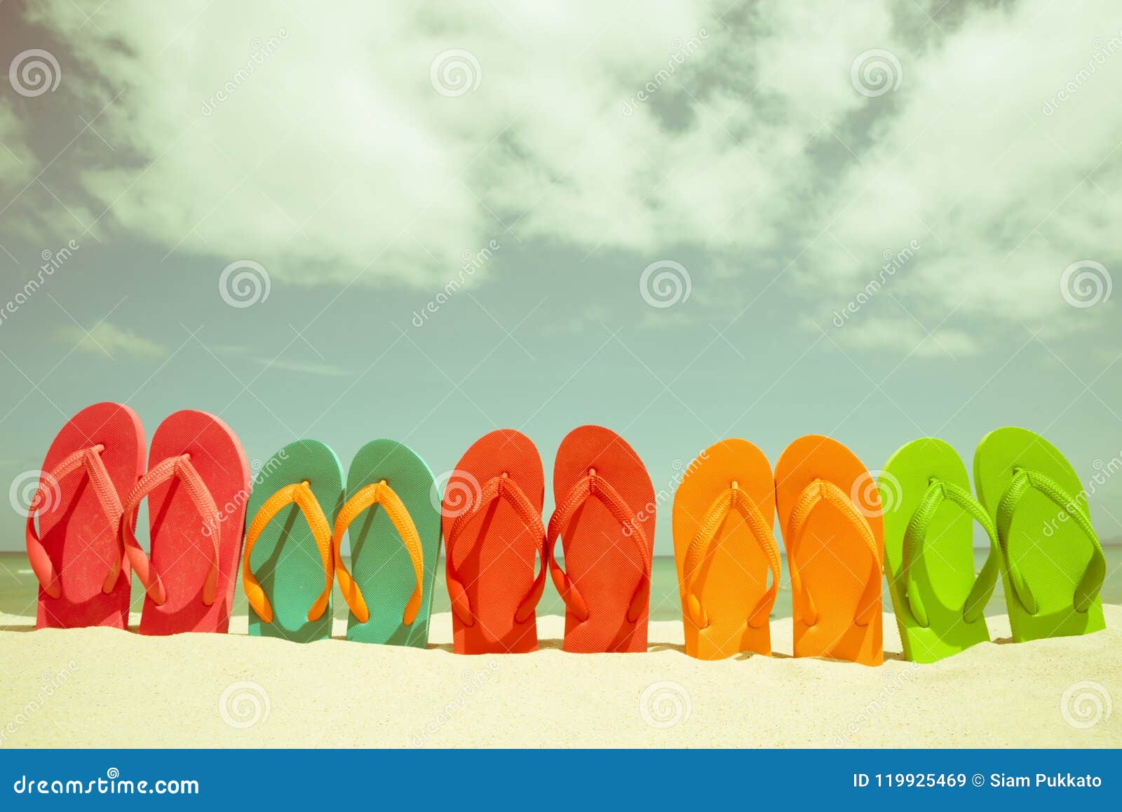Colorful Flip Flop on Sandy Beach, Green Sea and Blue Sky Stock Image ...
