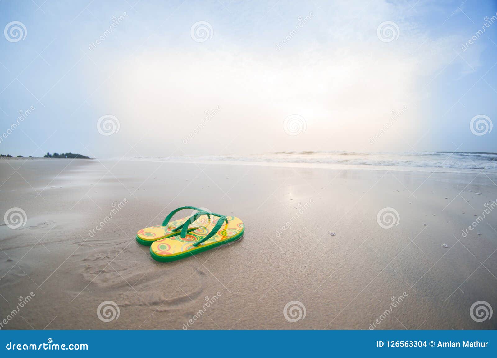 Colorful Flip Flops Lying on Beach in Pondicherry with Waves Sur Stock ...