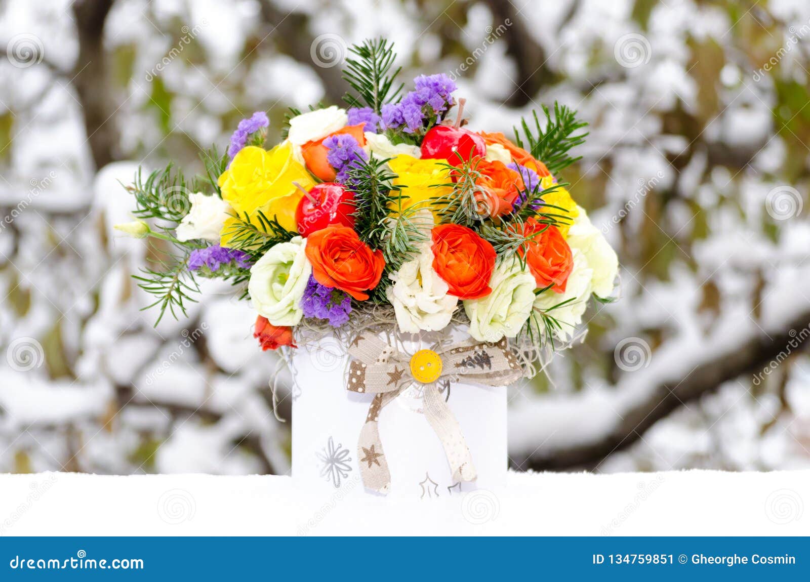 colorful floral arrangement in the snow