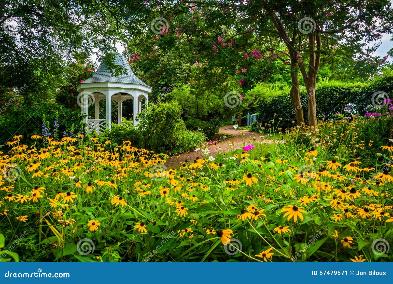colorful garden and gazebo in a park in alexandria, virginia.