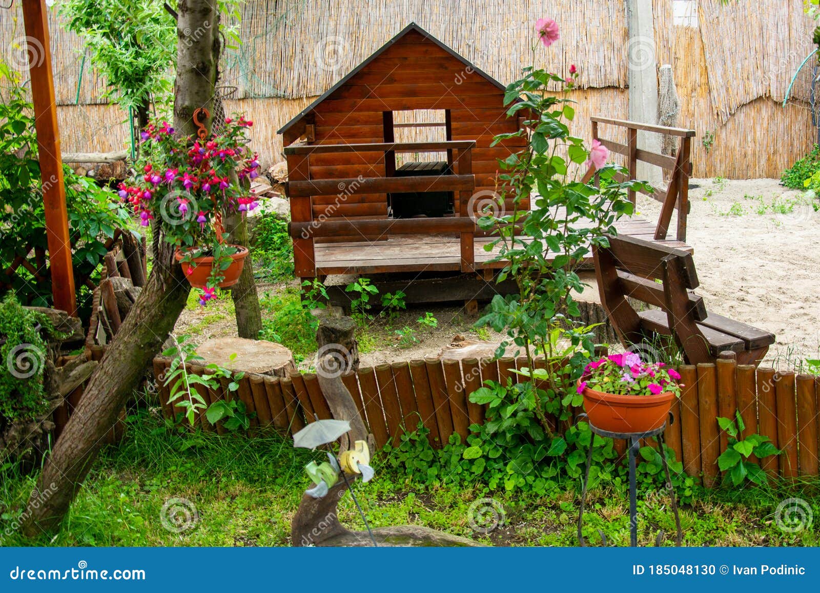 Colorful Garden in a Springtime and Dog House Stock Photo Image of