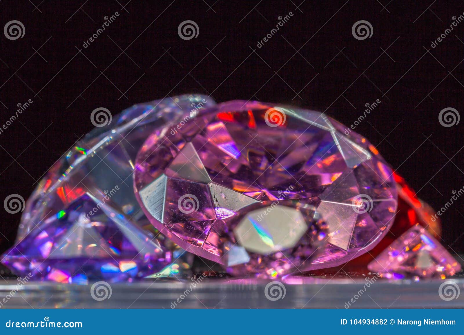 colorful gems on black background