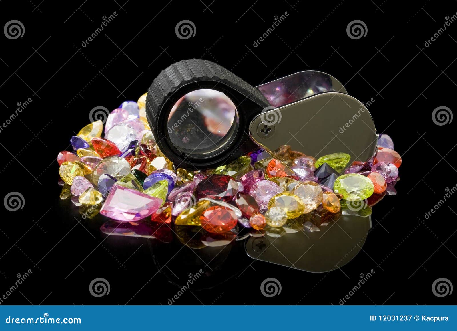 colorful gems and loupe