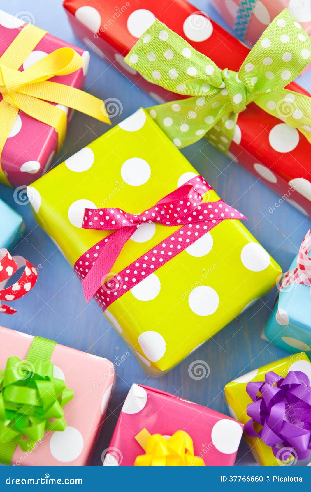 Colorful Gift Boxes Wrapped in Dotted Paper Stock Photo Image of