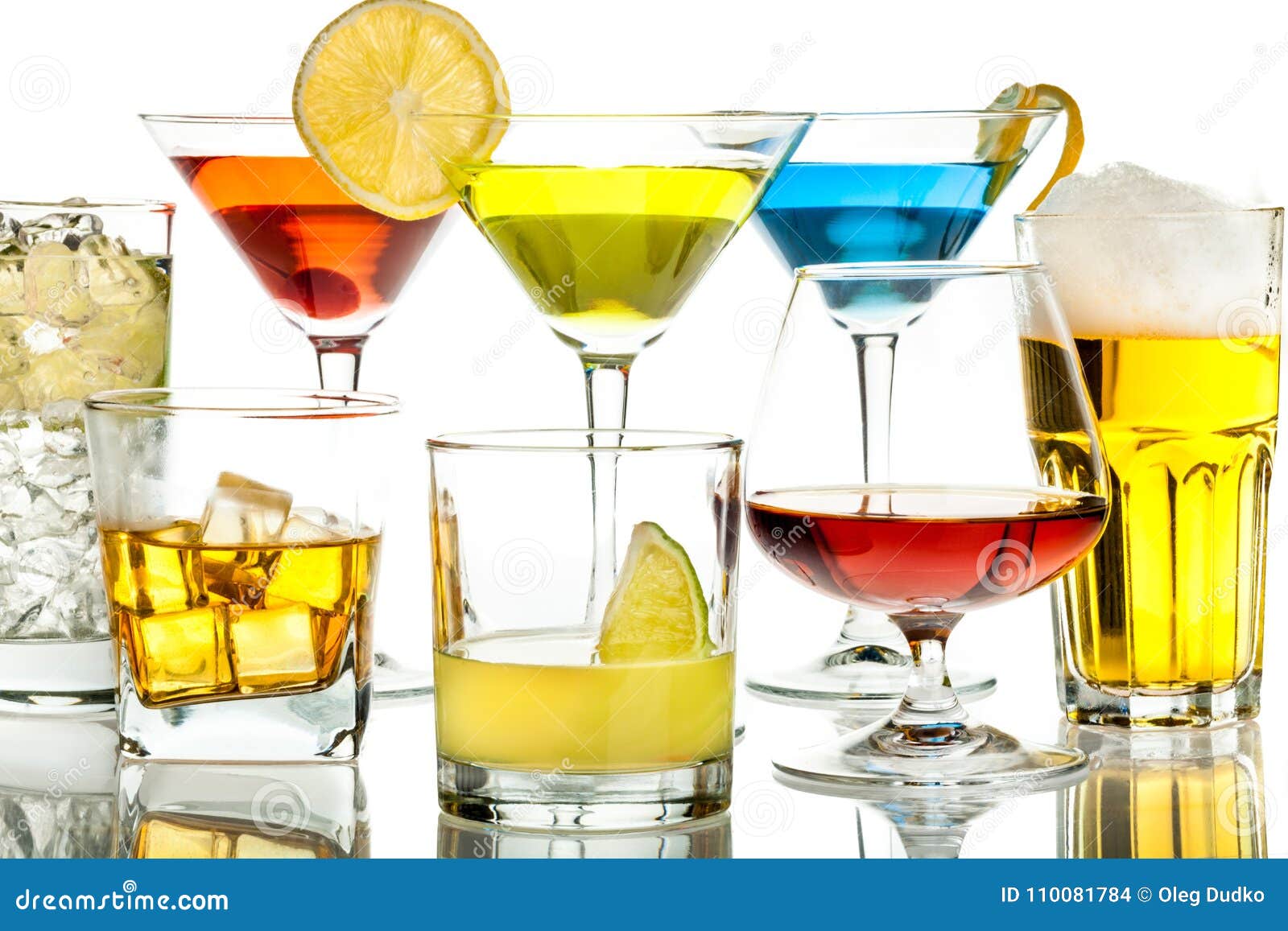 colorful coctails in glasses on white