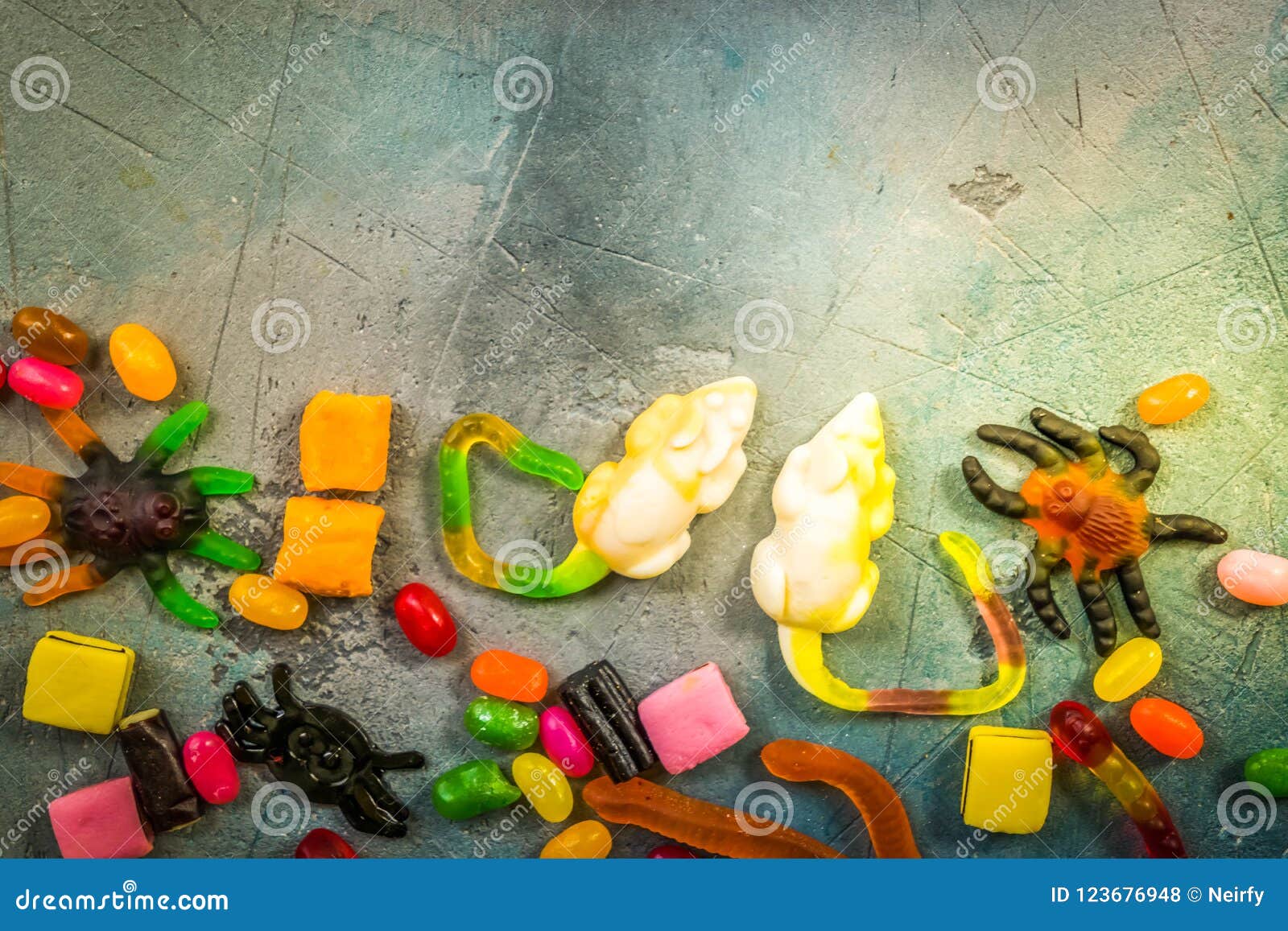 Colorful Halloween Candies on Stone Stock Photo - Image of overhead ...