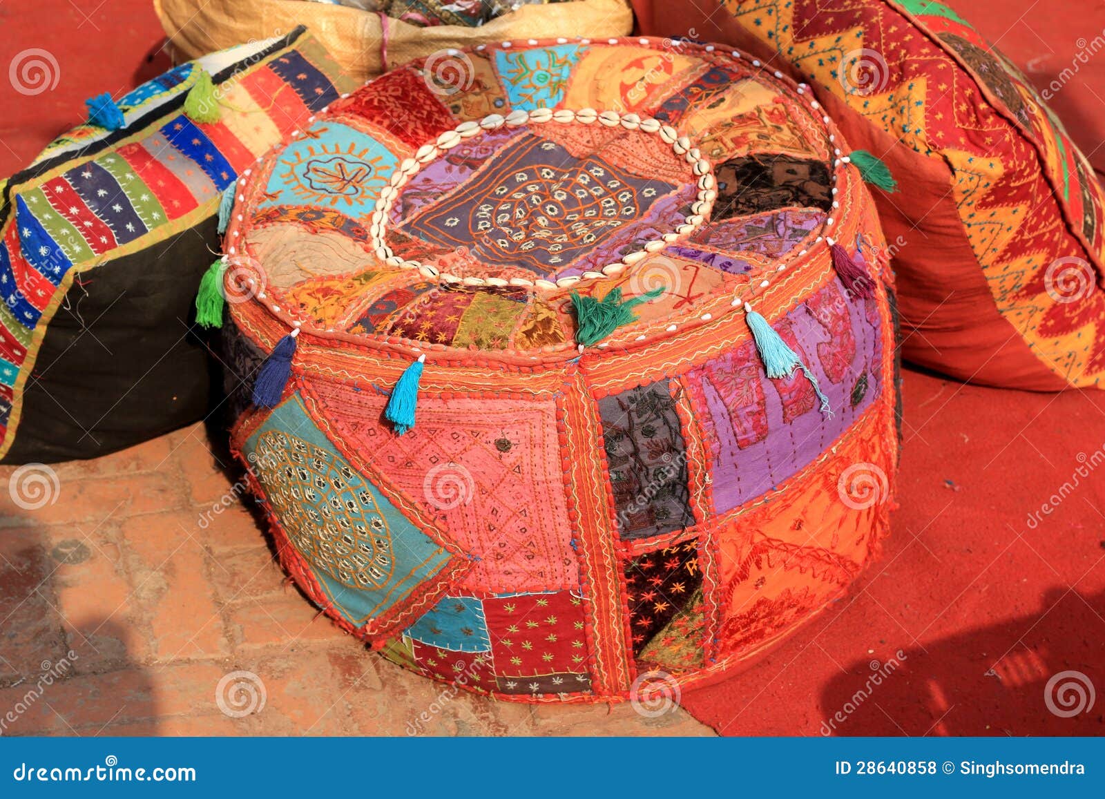 colorful hand made cushions and bean bag